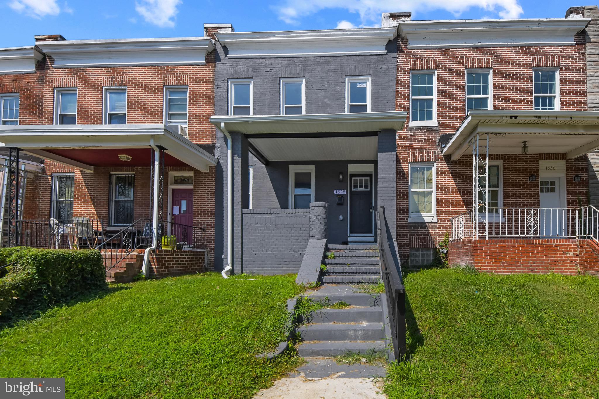 Welcome to 1528 Appleton Street, a fully renovated 4-bedroom, 3.5-bath gem in the heart of Baltimore. Rebuilt from the studs up, this home blends modern luxury with thoughtful design, including a rare 8x12 rear extension that adds valuable living space.
Step into the open-concept kitchen featuring granite countertops, a 7.5-foot island, gas cooking, white shaker cabinetry, and stainless steel appliances—all set atop waterproof flooring that spans the entire main level. The living area is anchored by a sleek electric fireplace, custom built-in shelving, and triple tray ceilings for added architectural flair.
Upstairs, the true primary suite boasts a spacious walk-in closet and a spa-inspired bath with dual vanities and room for a king-size bedroom set. Every level includes a bathroom for added convenience, including a second full bath with double sinks and upscale finishes.
Enjoy outdoor living with a fenced backyard, covered front porch, and plenty of curb appeal. All furniture and appliances are included, making this a truly turnkey opportunity. With its thoughtful upgrades and standout features, this home is a must-see!