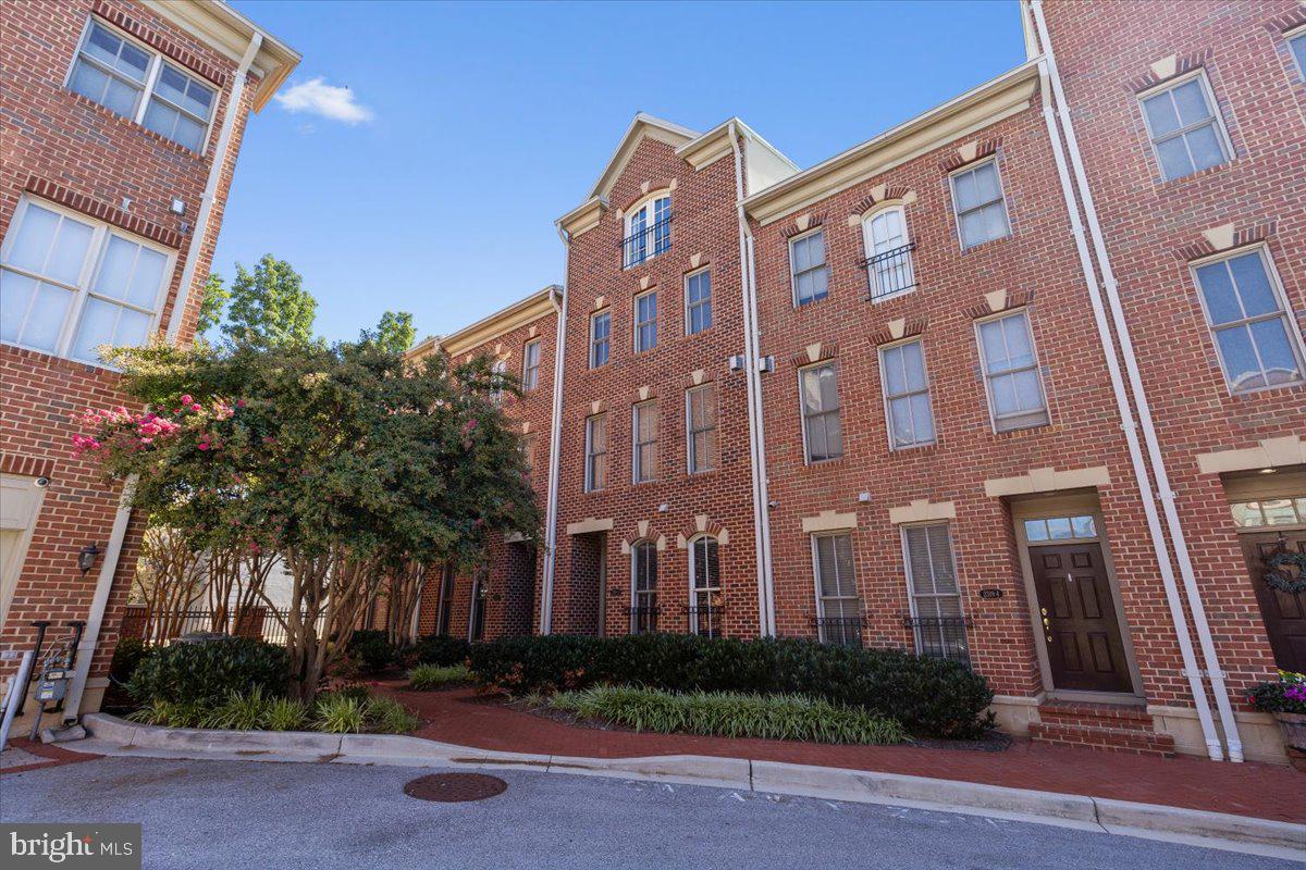 This stunning townhome in North Shore Residences offers premier waterfront living in the heart of Canton with an indirect water view from the three upper levels. The entry level features a versatile bedroom or office, a half bath, and access to the two car garage with additional two car parking pad. The main level boasts gleaming hardwood floors and an open concept design, including a spacious living room with a gas fireplace, a gourmet kitchen with granite countertops, stainless steel appliances, a center island, and direct access to the deck, perfect for entertaining. Upstairs, you’ll find two comfortable bedrooms and a full bath, while the top level showcases a luxurious penthouse style primary suite with a Juliette balcony overlooking the water. The spa inspired bath features dual vanities, a soaking tub, and a separate glass enclosed shower. Enjoy being just steps from Canton’s vibrant waterfront, restaurants, and shops, with nearby attractions like Patterson Park, Canton Waterfront Park, Fells Point, Harbor East, and the Inner Harbor. Commuters will appreciate quick access to I-95, BWI Airport, and Penn Station.