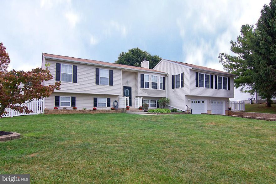 Lots of square footage makes endless Possibilities in this split level, possible income generating home. Beautifully well maintained, in sought after Manchester, with an in law suite too! Spacious, open floor plan makes this perfect for the whole family. Gorgeous Master Suite w/AMAZING master bath & SEAMLESS shower!  Huge kitchen Stainless Appliances w/slider out to maintenance free deckS pool HUGE Stamped concrete patio  SHED & fenced yard. Finished lower level w/ family room, bath, & WOOD Burning Fireplace  HUGE Bonus Room/STUDIO w/ NEW flooring.  Separate entrance into the bright in law suite, with a FULL kitchen Washer/Dryer, and a deck! This Space has SO many possibilities.  Lot's of curb appeal and a GARAGE! Conveniently located to EVERYTHING, on a PRIVATE QUIET Cul de sac.