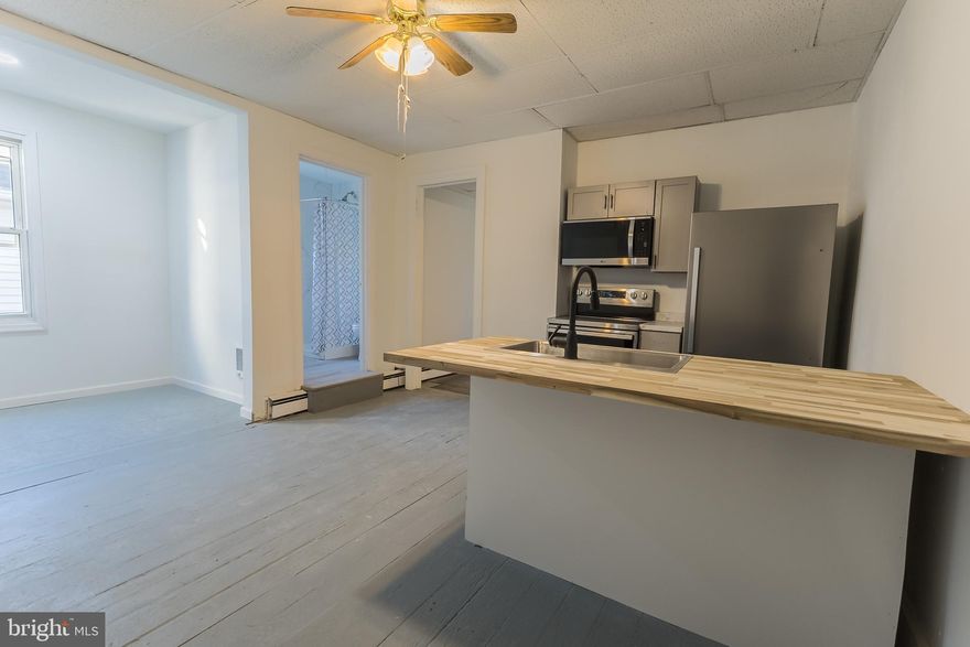 Coming soon! More photos to come!
Welcome to 424 East Market St in Pottsville, Apt B! This remodeled apartment is ready for it's new tenants. This 2 bedroom has a large living room and kitchen with a custom butcher block island. The  renovated bathroom has a beautifully tiled shower. There is a shared laundry area on the 2nd floor.  Pets are also welcome with a pet fee. If you are looking to call this lovely rental home, call for a private showing today! There is a credit and background check. First month and security deposit is required. Apt A, located on the first floor, is a 3 bedroom renting at $1,250 a month too.