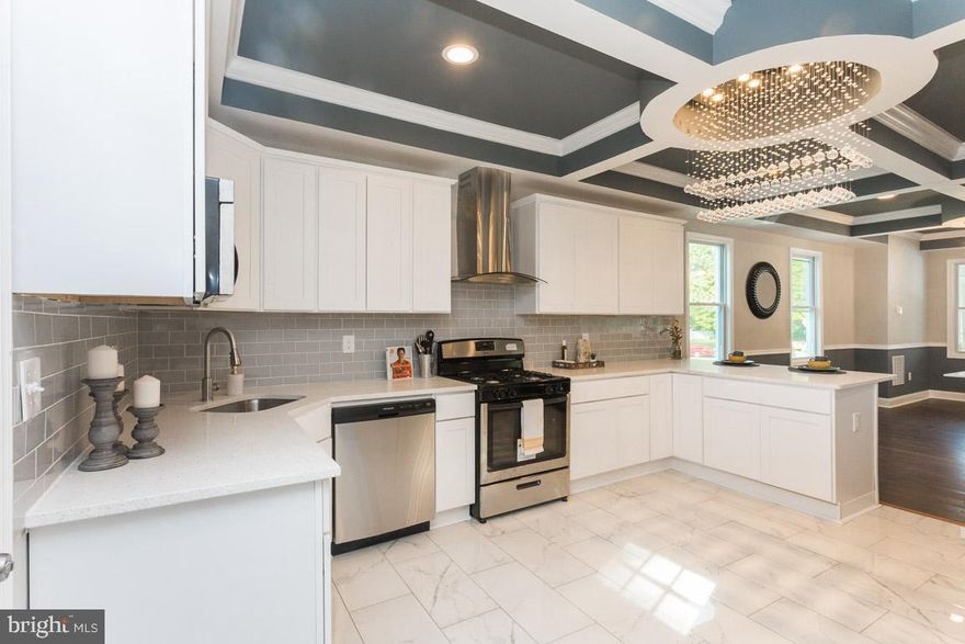 DONT MISS THIS OPPURTUNITY TO OWN THIS COMPLETELY RENOVATED HOUSE!   4 BR. AND 3 FULL BATHS. 3 WALK IN CLOSETS.   HUGE  BACKYARD, BRAND NEW DECK  WITH AN UPDATED PRIVATE DRIVEWAY AND SPACIOUS SHED FOR STORAGE. OPEN MAIN LEVEL LAYOUT WITH WELCOMING DINING ROOM AND LIVING ROOM INCLUDING A BEAUTIFUL CHANDLIER, GOURMET KITCHEN WHICH INCLUDES NEW APPLIANCES, GRANITE COUNTERTOPS, AND HARDWOOD FLOOR THROUGHOUT THE MAIN LEVEL. GORGEOUS CERAMIC TILE BATHROOM WITH SHOWER AND JACUZZI WHERE YOU CAN UNWIND AND RELAX. BEAUTIFUL MASTER BEDROOM INCLUDING MASTERBATH AND SPACIOUS WALK IN CLOSET.  FINISHED BASEMENT.  CLOSE TO MANY SHOPS .  EVERYTHING YOU NEED FOR YOUR DREAM HOUSE . COME AND CHECK IT OUT!