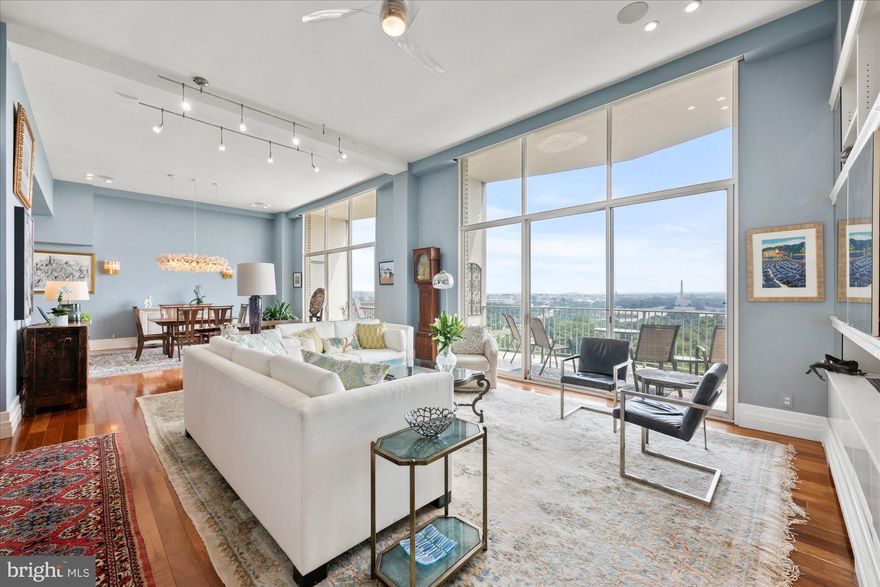 Welcome home to an absolute jewel of an offering, with iconic, unencumbered river, monument and city views (could be in a movie!) this extraordinary residence is a fully reimagined combination of 2 units into one magnificent home. 2 stories, 2 Bedrooms, 2 bath, 2,200 square feet of exquisite and functional design, sprawling outdoor space with sweeping, year-round,  views of the Potomac River and of DC’s most iconic monuments. Imagine Summer nights spent listening, from your balcony high above, to the Marine Corps Band or the bells of the Netherlands Carillon or hosting the 4th of July party with the best view in town. #838 is located at Prospect House, a mid-century modern building renowned for its unique architecture and panoramic views and featured in James Goode’s Best Addresses: A Century of Washington’s Distinguished Apartment Houses.

Upper-Level Features:
Gracious receiving foyer with walk-in closet and dumbwaiter with access to Kitchen.

Main-Level Features:
Spectacular, open stair case leading to the main level with floor to ceiling windows; beautifully curated space designed by acclaimed interior designer Lisa Vandenburgh and Scott Moomey of Muse Kirwan Architects; oversized, open Living Room with 17’4” ceiling, transparent ceiling fan, access to outdoor space and gorgeous built-ins; large Dining Room with 17’4” ceilings, Emanuel Morez chandelier, vintage mid-century sconces, stunning views to dine by and access to outdoor space; fabulous, Cook’s kitchen with large breakfast bar that seats 4; honed marble countertops, stunning gold gilt painted with glass overlay backsplash, modern, glazed cabinetry to the ceiling, built in stainless steel appliances (Bosch, Café and Jenn Air), island, recessed lighting and walk in pantry; cozy Library/Office with built in, open shelving and hand glazed walls; Primary Suite with 2 custom designed walk-in closets, ceiling fan, Carrera marble bath with stainless steel fixtures and glass surround, custom filagree sconces and light, and large vanity with storage; Bedroom #2 with large walk-in closet, ceiling fan, and Full Bath with tub,  Silestone vanity and quartz/slate walls and floor; hardwood floors throughout; discreetly placed, whimsically designed Powder Room with raised  Onyx bowl and backlit resin mirror; 42’ balcony across the rear of home accessed through brand new floor to ceiling sliding doors.
Other Features:
Brand New (10/2025) sliding glass doors and transoms to huge balcony; 4 zones in unit, remote controlled window treatments in Living and Dining Rooms, dumbwaiter, East West exposure for excellent cross ventilation
Condo fee  includes all utilities including water and building amenities (pool, fitness, common areas). Prospect House has received an A+ rating by its auditors.
Prospect House is sited on 5-acres of meticulously landscaped grounds and features an Olympic-sized swimming pool and new elevators
2 parking spaces, separately deeded, G2 #249 & #264
Prospect Market (convenience store, dry cleaner) on site, walk to Safeway, Whole Foods and GW/Mount Vernon path, 5 blocks to Rosslyn Metro (Silver, Orange and Blue), The Crossing Clarendon for shopping, fine and casual dining and easy trip to Pentagon City Mall, Roosevelt Island or Georgetown, commuter’s dream with easy access to Route 50, GW Parkway and I-66.