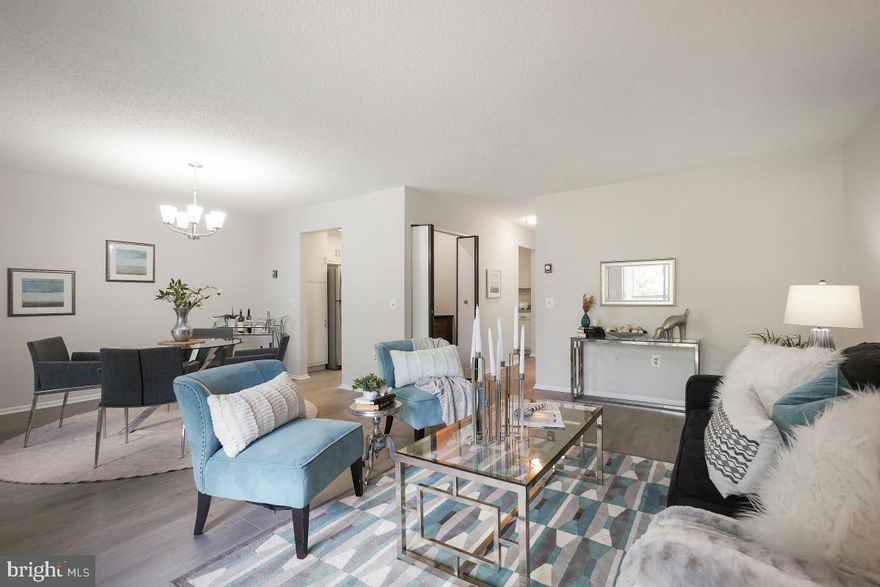 Beautiful, remodeled apartment in the 55+ active adult community of Leisure World that lives like a resort! There's new LVP flooring in the spacious living and dining rooms, new carpet in the bedroom and on the delightful balcony (that offers a wonderful view!), new stainless steel appliances and a new hot water heater! There's also an additional half bath, plus a wet bar! Best of all, all of the utilities are included in the condo fee! Freshly painted throughout, this delightful apartment offers a flowing floor plan, perfect for entertaining! There's even a convenient carport parking space (#2F) and additional storage! Community amenities include indoor and outdoor pools, a beautiful fitness center, an 18-hole golf course, billiards and ping pong rooms, an auditorium and pickleball courts, 2 restaurants plus a pub, an art studio, woodworking shop, library, MedStar Health Center, 24-hour security and so much more! This condo is a terrific value in today's market! Any offers due Monday 8/28 @ 5:00pm.