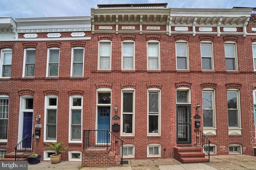 Welcome to the heart of Canton! This beautiful home, just a few blocks from O'Donnell Square, offers an inviting haven of comfort and style. The spacious living room boasts a charming fireplace and delightful exposed brick, complemented by the warmth of hardwood floors. The kitchen is a culinary dream, featuring elegant granite countertops, maple cabinets, a convenient breakfast bar, and a separate dining area. Upstairs, two generously sized bedrooms await, accompanied by renovated baths and a luxurious soaking tub. The finished basement presents a versatile bonus room, while the rooftop deck treats you to absolutely breathtaking views. Enjoy outdoor relaxation on the rear patio, encased in privacy fencing. With great location perks, easy parking, and close proximity to Canton Crossing, this home harmoniously combines convenience and sophistication.