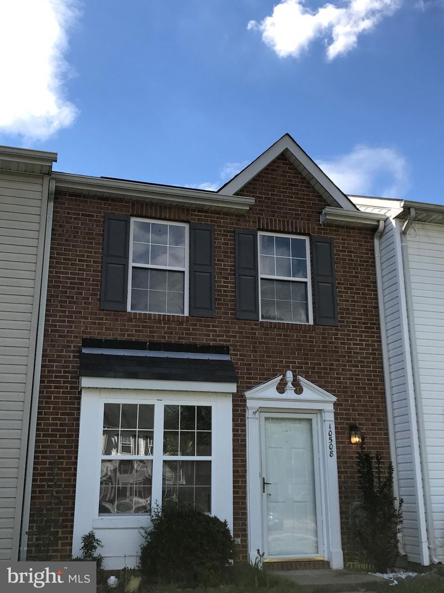 Lovely brick front townhome that is bright and open.  Entire home has been repainted with new carpet.  Brand new refrigerator too.  Colors are clean, fresh, and neutral - ready for you to move in today and make your own.  Both MBR and second bedroom are large and spacious.  You can own this home for less than rent and close quickly.