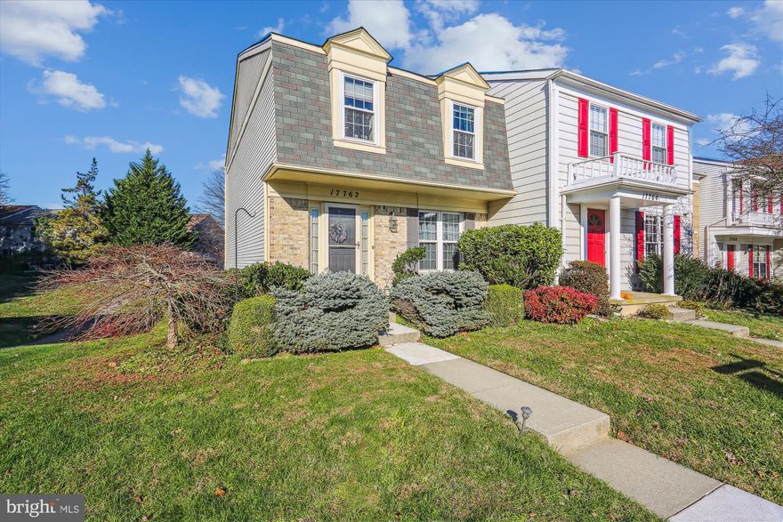 All systems including roof, windows, soffit and fascia exterior trim wood were replaced - wonderful condition. End unit townhome with walk-out exit, fenced yard, deck, custom landscaping, and beautiful view of greenspace. Two reserved parking spaces out front (#49).