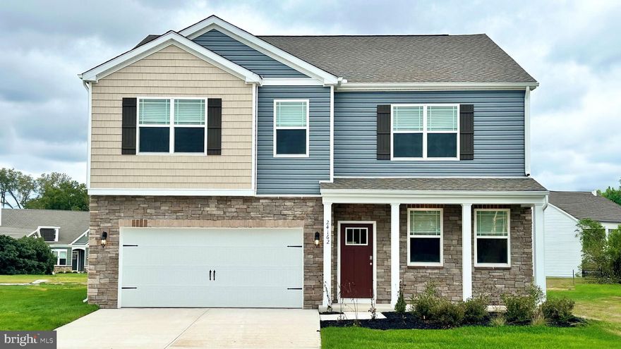 Discover 29891 Londyn Lane, a new home under construction in Gannon Range, a new community in Easton, MD. The Hanover, a contemporary 2,818 square feet two-story home, features four bedrooms, two and a half bathrooms, a flex room, a home office, a gas fireplace, and a two-car garage. 

As you step into the distinct foyer you will appreciate the office with glass French doors that provides the perfect space for a home office or a private den. The flex room is versatile and could be used for a formal dining room or a playroom. 

The spacious kitchen boasts an abundance of white cabinetry and granite counter space, an expansive walk-in pantry, a large island with room for seating and stainless-steel appliances. The kitchen has an eat-in dining space that flows perfectly into the sizeable family room. 

The powder room is conveniently located on the first floor, and a coat closet is located near the two-car garage. 

Upstairs, the owner’s suite boasts an ample bedroom, a generous walk-in closet and an oversized owner’s bathroom with a linen closet. The three additional large bedrooms and expansive open loft upstairs allow for everyone to have their own retreat. 

The second floor also features the laundry room, a roomy secondary bathroom with double vanity and a large hall linen closet. 

The included fully sodded, landscaped, and irrigated lawn, white window blinds and an innovative Smart Home® package will give you complete peace of mind living in your new home.

Pictures, artist renderings, photographs, colors, features, and sizes are for illustration purposes only and will vary from the homes as built. Image representative of plan only and may vary as built. Images are of model home and include custom design features that may not be available in other homes. Furnishings and decorative items not included with home purchase.