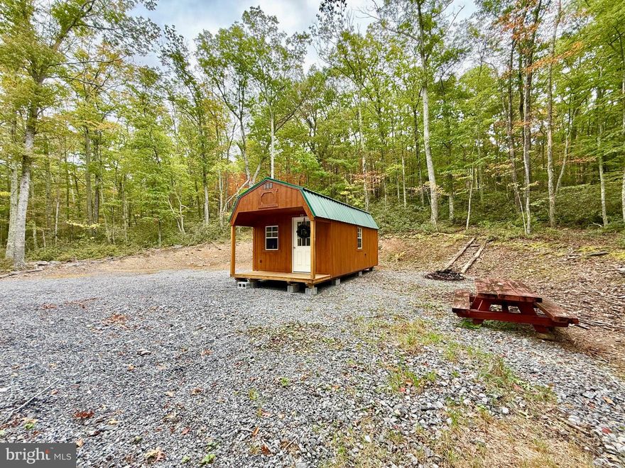 Beautiful 4.17-Acre Parcel at Spruce Shadows

Nestled just below the peaks of Spruce Knob—the highest point in West Virginia—this 4.17-acre property offers the perfect setting to build your dream home or mountain getaway. Whether you’re envisioning a full-time residence, a cozy cabin, or simply a spot to park your camper for up to 90 days at a time, this property provides endless possibilities.

The lot is already improved with a private driveway, underground electric, and a septic system. A small cabin is also located on-site, ready to be finished to your preference. For outdoor enthusiasts, the property features a private walking trail that connects directly to the National Forest, offering unmatched access to pristine wilderness and abundant wildlife.

Opportunities to own property in Spruce Shadows are rare. This location places you just minutes from Spruce Knob and a short drive to iconic destinations such as Seneca Rocks, Blackwater Falls, Canaan Valley, and Timberline Ski Resort.

Don’t let this one pass you by—schedule your private tour today and experience the beauty and tranquility of Spruce Knob living.
