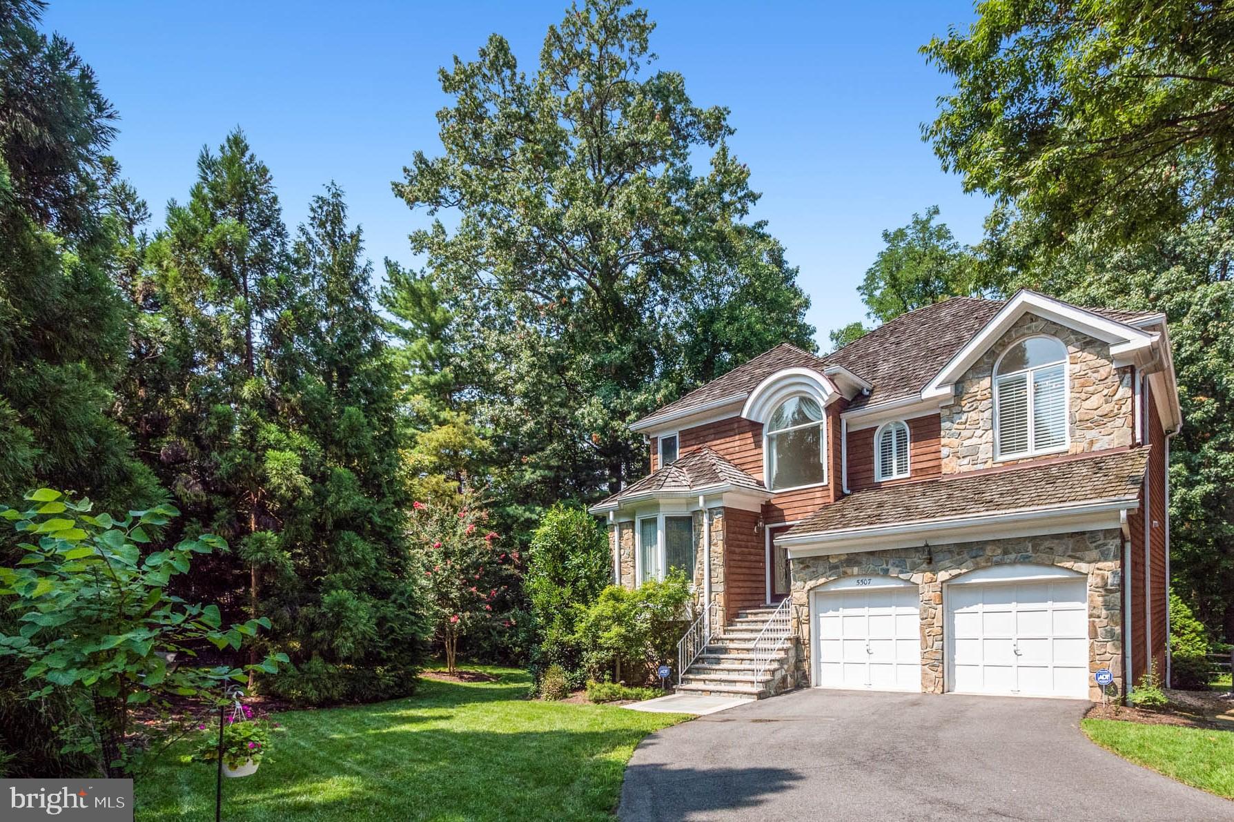 Welcome to this stunning home with a contemporary flair, located in the desirable Grosvenor Woods community in Bethesda. As you enter, you'll be greeted by the two-story foyer with an abundance of natural light pouring in through the oversized windows, highlighting the open floor plan and high ceilings. The gourmet kitchen is a culinary dream come true, boasting marvelous counter space and top-of-the-line GE Monogram appliances ready to follow your every command. Adjacent to the kitchen is a sun-filled morning room perfect for casual dining, while the patio and deck offer ideal outdoor spaces for al fresco meals. The two-story great room with a stone fireplace and wet bar provides ample space for entertaining or simply relaxing. Upstairs, the primary suite is a luxurious retreat with a beautifully appointed primary bath featuring a soaking tub and glass-enclosed shower stall. There are also two additional bedrooms and a full bathroom. The walk-out lower level offers even more space, with a family room, fourth bedroom, and full bath, perfect for hosting guests or creating a home office.
Located in the charming Grosvenor Woods community, this home is conveniently situated near the Grosvenor/Strathmore Metro, the Trolley Trail, NIH, Whole Foods, Baldacci's, and the shops and restaurants at the Wildwood Center. Don't miss this incredible opportunity to rent a luxurious home in a prime Bethesda location. Available July 25'th. The owner prefers a multiyear lease.