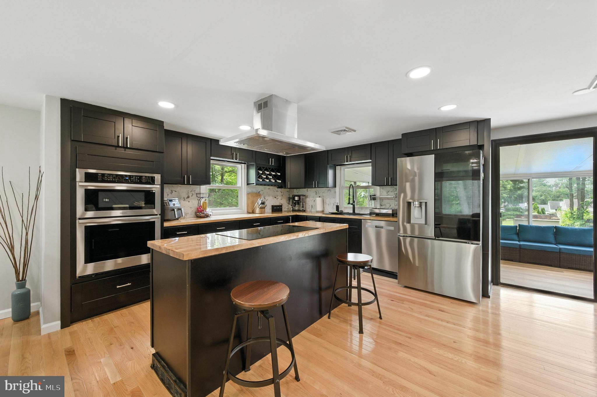 BACK ON MARKET! Buyers got cold feet.
This beautifully maintained 4BR, 2BA home offers 1,994 sq ft of living space in pristine condition, located on a private road in the desirable Central Bucks School District. Featuring a living room, dining room and kitchen open-concept layout with hardwood floors with sliding doors to a large sunroom overlooking the spacious yard and white picket fenced in-ground pool—perfect for entertaining!
The main level includes a generous primary bedroom with a large walk-in closet, another generous size bedroom and a main level bath. The lower level offers an additional living space complete with a wood-burning fireplace that can be used as a living room or man cave, etc, two additional bedrooms, a full bathroom, laundry room, and a door that leads to the double garage. Additional highlights include a newer roof (2024), heating system (2024), and central A/C (2024), plus a 2-car garage with garage openers and oversized driveway fitting up to 6 cars. Pool was just recoated and repainted so new owner can be carefree for many years to come! All situated on a 0.62-acre lot in a peaceful, convenient location. A true gem! Wegman's, TJ Maxx, PF Changs and other stores all in walking distance!