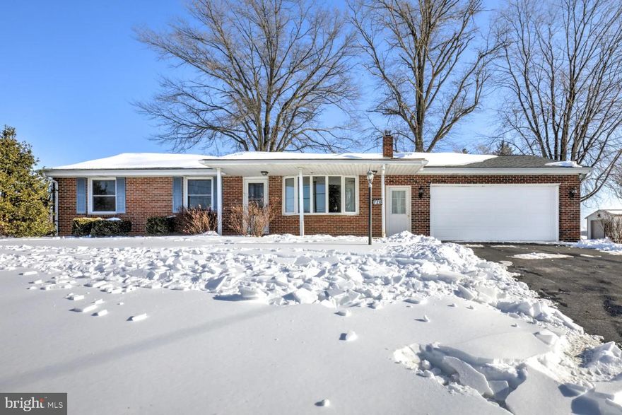 THIS PROPERTY IS GOING TO AUCTION ON SATURDAY APRIL 4, 2026 @ 11:00 AM. THE LIST PRICE ONLY REFELCTS THE SUGGESTED STARTING BID. Clean, freshly updated all brick 3 bedroom, 1 full bath Rancher with quiet rear covered porch and patio on a .53 acre country lot. The home features a living room with bay window; hardwood flooring throughout the first floor; dining room/kitchen with maple cabinets, appliances and sink overlooking the backyard. Lower level family room with brick hearth, utility room and laundry hook-up. 24' x 23' attached 2-car garage, covered back porch with a level backyard overlooking farmland.
