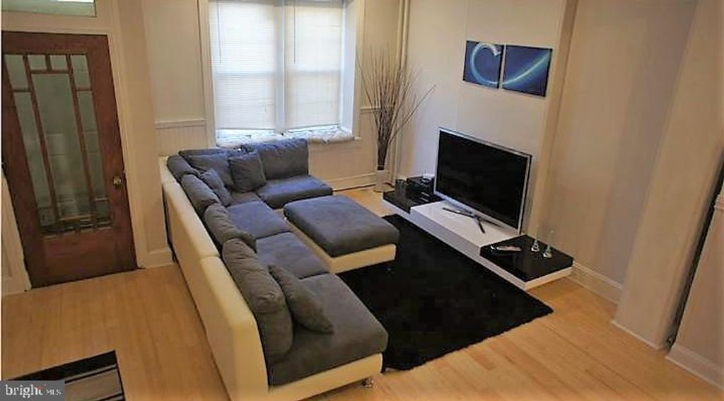 Photo of 128 JAMESTOWN ST, PHILADELPHIA, PA 19127 (MLS # PAPH2257542)