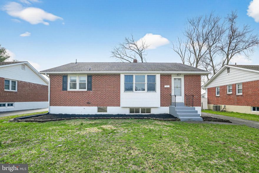 Welcome to 53 Marta Dr, where classic brick ranch charm meets a fresh, modern renovation in the sought-after Eastburn Acres community of Pike Creek! Thoughtfully updated and completely turn-key, this 3-bedroom, 1.5-bath home offers the perfect blend of style, comfort, and convenience across 1,325 square feet of inviting living space. From the moment you arrive, the timeless brick exterior sets the tone. Step inside and you’re greeted by a bright, airy living room where refinished hardwood floors stretch across the main level, complemented by fresh paint and an abundance of natural light pouring through oversized windows. The layout flows effortlessly into the dining area, creating an ideal setting for both everyday living and hosting guests. At the heart of the home, the beautifully renovated kitchen stands out with crisp white cabinetry, sleek quartz countertops, stainless steel appliances, and gas cooking. Tile flooring adds durability and style, making this space as functional as it is visually appealing. Each bedroom offers comfortable proportions, hardwood flooring, and ample closet space, while the primary bedroom provides a quiet retreat with great natural light. The hall bath has been tastefully updated with a clean, modern vanity, tile backsplash, and a full tub and shower combination. Downstairs, the finished basement expands your living options with a spacious family or media room, perfect for movie nights, game days, or a home office setup. A convenient half bath, dedicated laundry area, and additional storage space enhance the versatility of this lower level. Out back, the fully fenced yard offers a private outdoor escape, highlighted by a brand new concrete patio ready for grilling, entertaining, or simply unwinding. The manageable lot size ensures low maintenance without sacrificing usable space. With driveway parking and a location just minutes from shopping, dining, and major routes, this home delivers both everyday ease and long-term value. Stylish, functional, and completely refreshed, 53 Marta Dr is ready to welcome its next owner. Schedule your showing today!