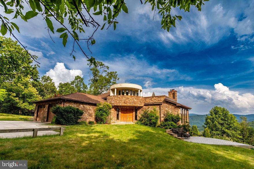 Unique home located on 11.62 pristine acres in the beautiful Lost River Valley of West Virginia.  Unrestricted property with prime views from every window.  It is located within 2 hours of Washington, DC and is every telecommuters dream location.  High Speed fiber optic connections make working from home a dream come true.  So many opportunities within minutes including a full gym, yoga studio, fresh meat and produce markets, dining and other shopping opportunities.  For the outdoorsman there is scenic hiking trails, disc golf, horseback riding,  WV State park and National Forest with native trout fishing. Must come and see to appreciate what this home and area has to offer!