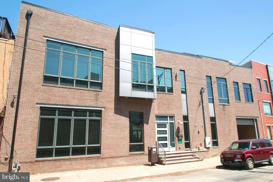 Welcome to this exceptionally unique home which features 3  (4 ) bedrooms, 4 full baths, 2 zone/3 HVAC compressors ( 1 in rear and 2 on roof) and private gated driveway with 2 car garage parking ( property can accommodate approximately 12  parking spaces. ) 
 Enter into the beautiful foyer area which  invites you to a wide open floor plan of living space with windows, windows, windows !! If you are not a fan of the typical  boxy , cookie cutter type of property, THIS ONE IS FOR YOU !! Your spacious living area has lots of room to spread out while entertaining guests as well as being able to cozy up to a very cool and funky graffiti tile fireplace and enjoy your quiet time. Your kitchen and dining areas are side by side and offer all  you would need from intimate dining to a private BBQ  bash during the spring/summer months.  This grand kitchen has granite counter space as far as the eyes can see , counter seating, Thermador appliance as well as a huge separate pantry room that includes  a 2nd sink. The dining area is drenched in sun light and is very spacious as it  offers direct access to a powder room and your very large back yard area.  From the dining area, you will also find access  to a separate  room with a full bath which can easily be used as a 4th bedroom or office area while working at home. You can then access your 2 car garage from the  inside or from your very convenient  front  gated driveway.  
Ascend to the 2nd floor by way of the gorgeous  custom stair case or  the very convenient elevator which can bring you down  to your basement area as well. The 2nd floor offers 3 huge bedrooms each with its own walk-in closets and  full 3 piece bathrooms equipped  with very large walk in stall showers and heated floors.  When entering your large spacious master bedroom, you will be wowed by the lovely exterior patio, lovely master bath and a  huge, custom walk-in closet. The 2 remaining bedrooms are also very large in size and each providing their own private bathrooms and walk -in closets. The laundry area is conveniently located on the 2nd floor with washer/dryer and sink.  Hop on your elevator and venture down to your basement area where you will find separate rooms for storage as well as tankless hot water, ADT alarm panel, sprinkler system, etc.  There is so much more to this gorgeous home that can be mentioned ......you have to see it to appreciate it !! Approximately 3 yrs left on tax abatement.  Make your appointments today and be WOWED !!!