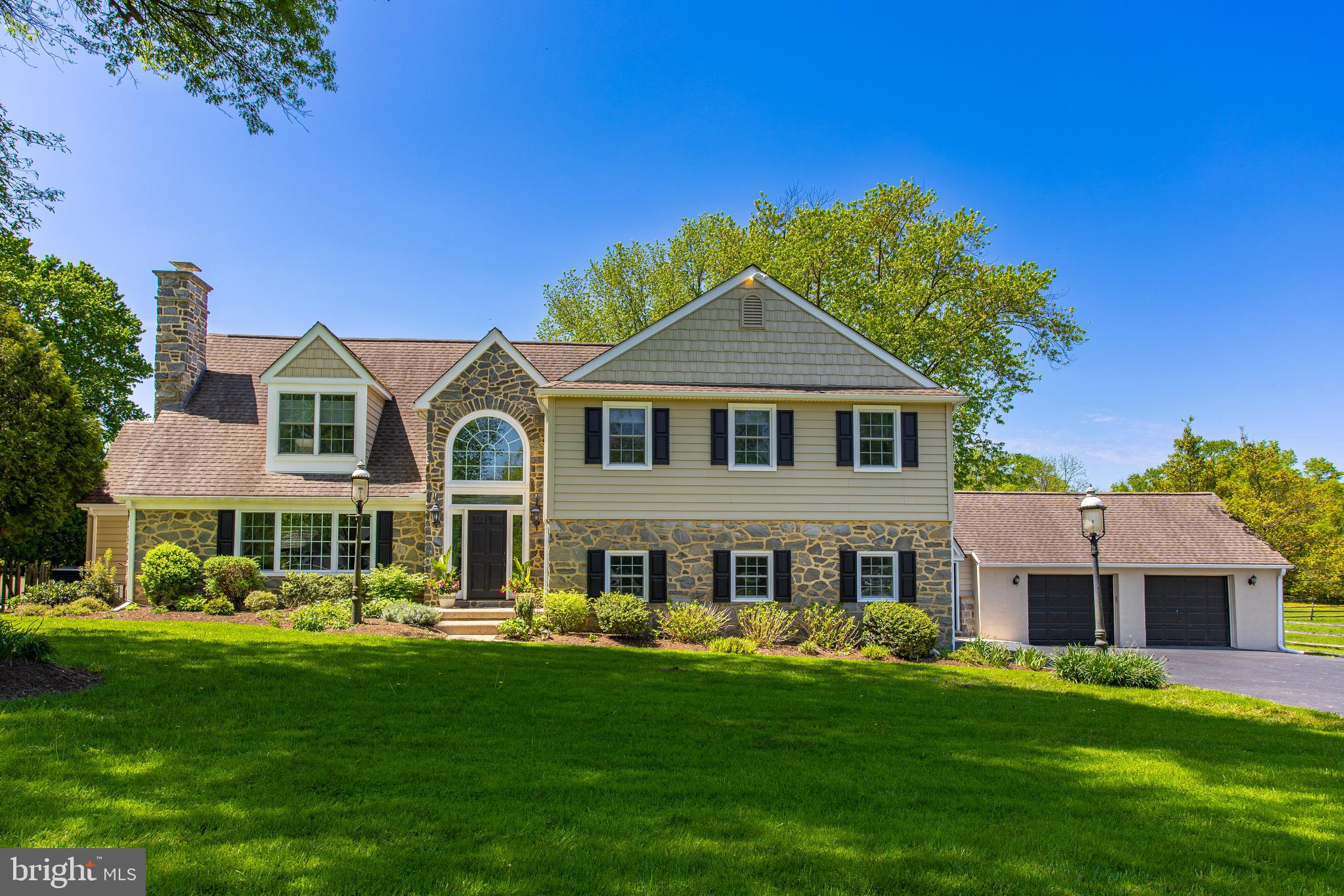 Welcome to one of the finest equestrian facilities in Delaware County! A well-appointed sanctuary sitting on 2 lots totaling 7.65 acres and with all the conveniences that make this home the perfect place to...HAVE IT ALL! Situated at the end of a quiet cul-de-sac close to Radnor Hunt and Ridley Creek State Park, this home offers peace, privacy, and luxury, without sacrificing convenience. The amazing barn structure is a luxury for both owner and animals alike. A Mennonite-built structure with 7 stalls for horses, goats, or whatever animals you wish to house there! Barn has a heated tack room with washer & dryer, private half bath, storage cabinets with granite countertops, interior wash wall with drainage, automatic fly spray system, dispensing to aisle, stalls and run-in, stamped concrete floor, loft for hay storage and a pair of “Big Ass” brand fans to keep it cool on those warm summer days. Each stall also has automatic water refill system and access to the small pen and then out to multiple pastures. The property boasts 6 pastures of varying sizes to keep your horses happy grazing. Ride your horse directly off the property, as there is immediate, easy access to miles of trail riding at Radnor Hunt, Ridley Creek State Park and the Okehocking Preserve. As an added bonus, you’ll find a run-in shed, separate smaller pasture for small animals like goats / alpaca, and a fully enclosed chicken coop. The beautiful 2-story residence has a light-filled entryway that offers a grand welcome and, as you move from room to room, you’ll find both finishing touches and views that will help you leave the chaotic world behind. A large, bright gourmet kitchen provides the convenience of sitting at the oversized center island to have a quick bite, or preparing meals for large group gatherings. Two sinks, two dishwashers, and two ovens, with granite countertops, a pantry and a built-in desk area. Conveniently off the kitchen, find a back hallway with the first of 3 laundry rooms, a full bath, and a side door leading to the patio and pool with heated spa. Enjoy dinner with family or many guests in the formal dining room with stone fireplace and built-ins. To unwind, head into the great room, with vaulted ceilings and its own fireplace, complete with a custom wood and copper mantle. Follow the first floor main hall to step down to a sunken den for quiet conversation near another stone fireplace. Open French doors to a large sunroom with raised ceiling, radiant heat and large glass doors leading outside. This room offers extra space for so many possibilities - a fun playroom, a peaceful yoga space, or an art studio! Tucked away behind the den, you’ll find a small custom powder room and step down yet again into the generously-sized game room! Built in bar and a pool table (that remains with the house) still leave plenty of room for extra seating or additional game tables. At the end of the main hall find a private office, mudroom and attached garage entry leading to a oversized 2 car garage. The office has large windows, separate climate control and doors to both the hallway and to the backyard. A perfect work-from-home sanctum. The second floor boasts a primary suite with bedroom, walk-in “California” closet, bathroom with separate sunken Ultratub, stone shower, and custom carved-wood vanities, as well as an extra area to use as a 2nd office, dressing room, or meditation space. Down the hallway is a full bath, 2nd floor laundry room, and 4 more spacious bedrooms (one with its own ensuite full bath). And, if you are not busy enough with family and furry friends, this home is a gardener’s paradise, with multiple raised beds and areas ready to cultivate your favorite plants or vegetables. Come see how this home HAS IT ALL!
