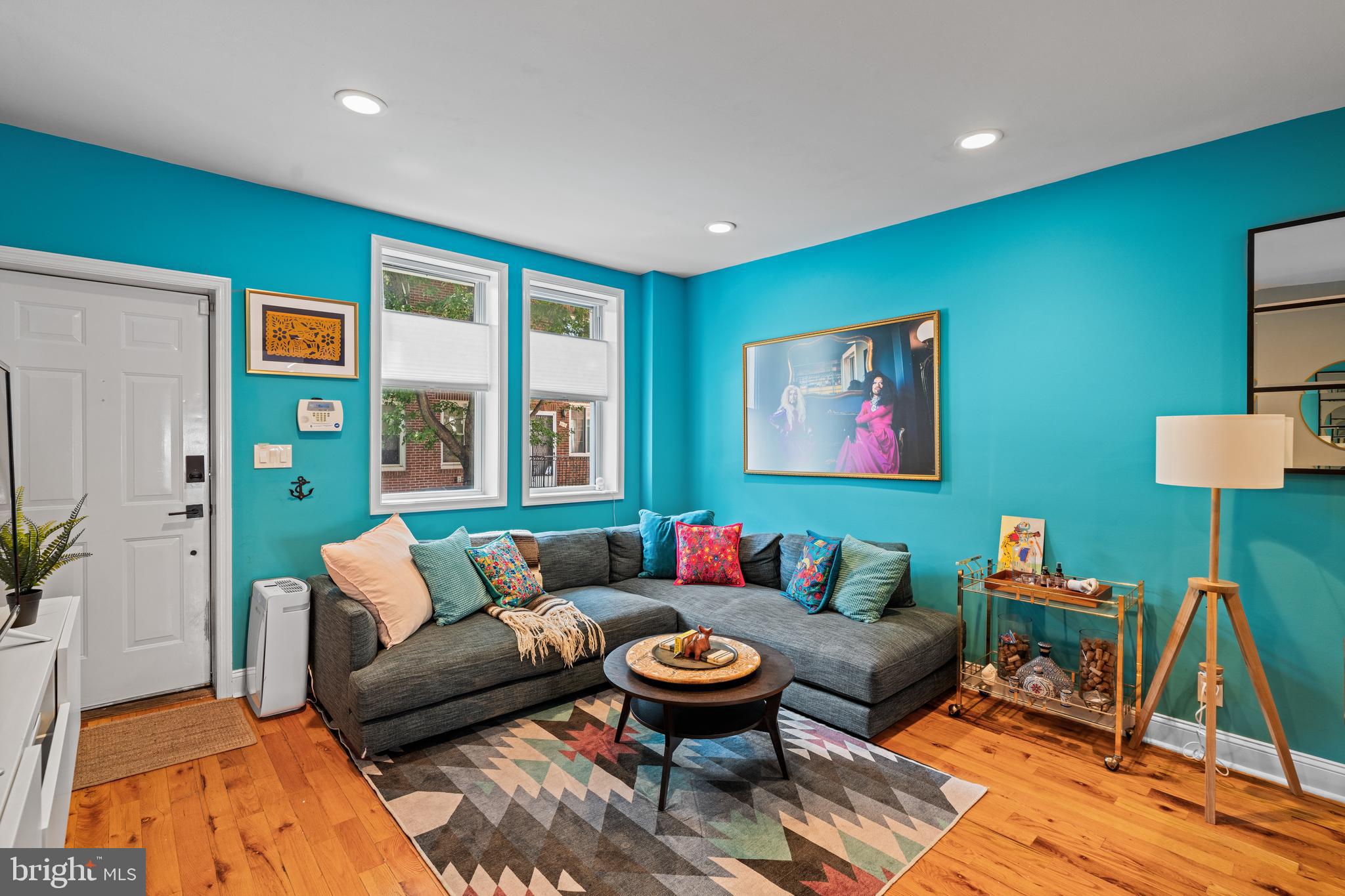 A solidly renovated home that isn’t bland or lacking style, and is just 2 blocks from Bok Building? You’ve found it! With three nicely sized bedrooms, hardwood floors, a main floor half bath, and a cute, brick paver patio, this one ticks all the boxes. The main level has an open floor plan with living and dining up front, both with a view of the variegated wood accent wall by the stairs. The kitchen looks timeless with white shaker cabinets, quartz countertops, white subway tile backsplash, and stainless steel appliances. The layout is ideal – plenty of work surface with cabinets and counters running along opposite walls, space for an island in the center, and plenty of light coming through the French doors at the rear. If you like to entertain or just have some “me” time outside, the outdoor space has a more finished look than most South Philly patios. Brick pavers and a wood fence make it feel more like “cozy home” than “concrete jungle.” Upstairs, the primary bedroom is at the front of the home and has built in wardrobe organizer closets and a ceiling fan to keep you comfortable during those in-between temperatures. The middle bedroom is also generously sized and has a large closet. The hall bathroom has a tub/shower with tile surround and a large vanity with storage. A built in linen closet in the hallway and the third bedroom round out the second floor. The basement is unfinished and home to the laundry and plenty of storage space. In the neighborhood, you’ll enjoy being very close (2 blocks!) to Bok Building, a former school building that is now home to many businesses, artist and maker spaces, coffee shops, and restaurants like Miles Table, Bok Bar, Irwin’s, Machine Shop, and Two Persons Coffee. Other popular neighborhood spots include Dickinson Square Park, Moonshine Philly, Rebel & Wolf Coffee, Good Hatch, Izzy’s 33, and more!