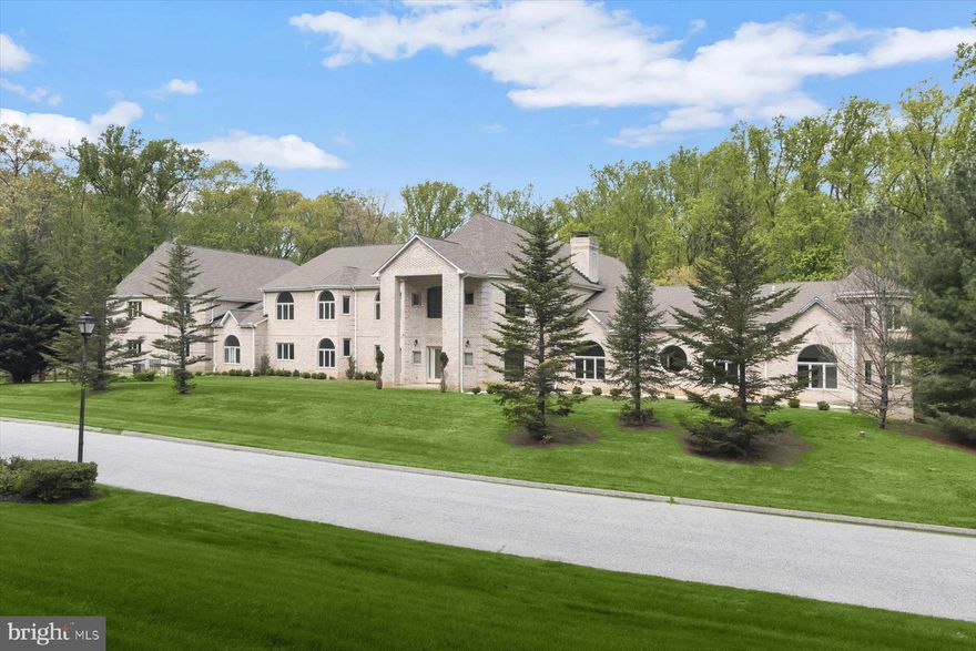 Impressive Estate offering over 31,000 Square Feet of High Lux Living & Entertaining

Tucked away in the sought-after Anton North community, this exceptional all-brick grand residence offers privacy, scale, and refined upgrades on a picturesque 3.47-acre corner lot.
Built in 2023, with a  partially finished interior showcases impressive architectural details across 31,000 square feet including 9’+ ceilings, cathedral and vaulted spaces, skylights, and a three-story gathering hall with a dramatic cascading center stair. Floor plans include details that set the stage for tremendous potential and customization.
Designed for both everyday living and grand high lux entertaining, the interior is plumbed for 2 gourmet kitchens, gas cooking, butler’s pantry, large fridge and freezer niches, multiple dining and living combinations, breakfast area, and a variety of flexible spaces including a studio, efficiency suite, and two entry-level en-suite bedrooms. Luxury touches are prepped and ready to be implemented that include a sport court, sauna, wine storage, multiple wet bars, soaking tubs, walk-in closets, and four fireplaces, including a dramatic double-sided design. 
Imagine seamless indoor-outdoor living with expansive low maintenance composite decks, patios outside, along with the sport court, steam room, theater, game room, library, loft and sitting rooms.  A 5-car-attached garage plus additional parking, a private asphalt driveway, and extensive outdoor lighting.
Energy-efficient construction with high R-values, advanced HVAC systems, water recycling features, and high-efficiency hot water enhance comfort and sustainability. 
This impressive property is a rare offering combining high lux design and modern amenities in a convenient Baltimore County location.