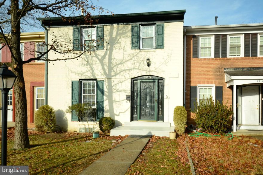 Updated brick interior townhome offers hardwood flrs on ML & UL.Kitchen renovated w/new cabinets (1/18), granite & SS appls (new DW & range hood) & huge pantry. New light fixtures throughout ML.MBA totally renovated/enlarged to include soak tub, sep shower & dual vanities (approx 2012). Replaced Roof/windows/HVAC. LL bath renovated 1/18. Walk-out rec rm to fenced patio with awning & garden area.