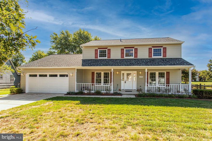 Former model home to the neighborhood... This exceptional Colonial is tucked away in a tranquil cul-de-sac and boasts numerous upgrades. The exterior showcases an inviting covered front porch and recent improvements such as the new roof, new siding, and new windows. Inside, you'll find a  fully remodeled kitchen with granite countertops and stainless steel appliances. Formal living room and dining room with upgraded crown molding, chair rail and custom curtains. The family room is a cozy retreat with an upgraded wood-burning fireplace. The main level also includes a mudroom with stainless steel washer and dryer plus extra cabinets for storage, a half bath, and a two-car garage.   Ascend the custom hardwood staircase to discover Wood look Pergo floors throughout the upper level. The owner's suite is a standout with a remodeled en-suite bathroom, while three additional bedrooms and a renovated hall bathroom complete the upper level. The fenced backyard features a spacious deck, brick paver patio, and storage shed. This property harmoniously combines classic charm with modern amenities in a prime location. Hampshire Subdivision also includes a community pool, walking/biking path, playgrounds and lake. Property features security equipment including a Ring doorbell and surveillance cameras, enhancing safety. Enjoy the convenience of soft-close cabinets in the kitchen. Don't miss the opportunity to make it yours today.
