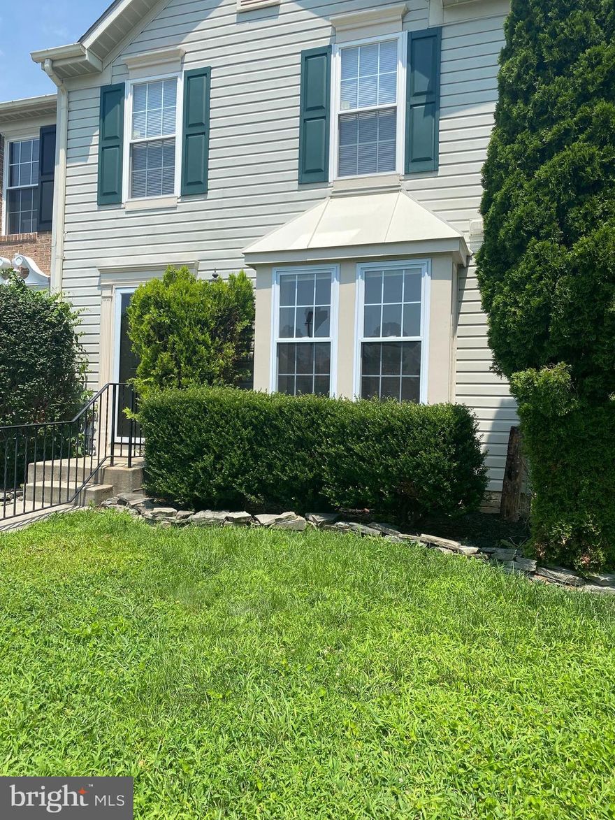 Beautiful end-row townhome with newly polished hardwood floors, a deck  and back yard space for entertaining. Basement can be used as an extra bedroom or second master.