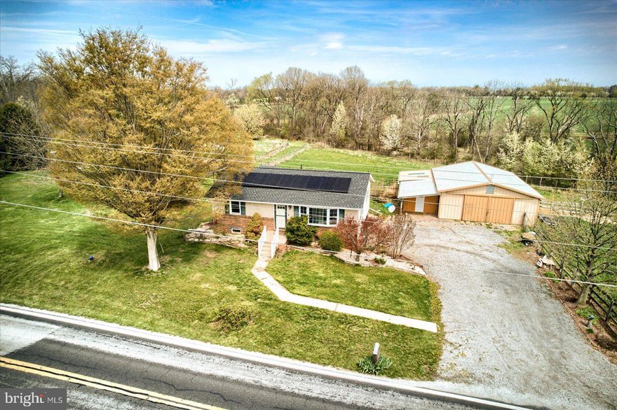 Discover serene country living with this turnkey Farmette, perfect for those seeking a mix of comfort and functionality.  Nestled on 3.86 acres, this property boasts of stunning fenced pasture views and comes ready for your homestead dreams.  Move-in-ready with a New Chicken Coop housing 11  laying hens and 1 rooster (barnyard mix),  along with a 3-stall horse barn with tack room and an additional insulated room.  The home features new oven, new floors, custom trim, new roof 2023 with fully insulated attic, new plywood, and gutter guards, along with solar panels.   New septic tank, UV light, and water filtration system 2023.   The main level includes 2 bedrooms, 1 bathroom, a living room, and an eat-in-kitchen.  Lower level offers a potential for a 3rd bedroom/office, a family room, laundry room, and 1 car attached garage. 
The tree lined portion at the rear and east side of the property is located in flood Zone A, however the home is not located in a flood zone, and sellers did not need flood insurance. 
Don't miss this opportunity to own a peaceful, functional Farmette ready to welcome you and your animals.  Schedule your showing today!
More photos coming soon!