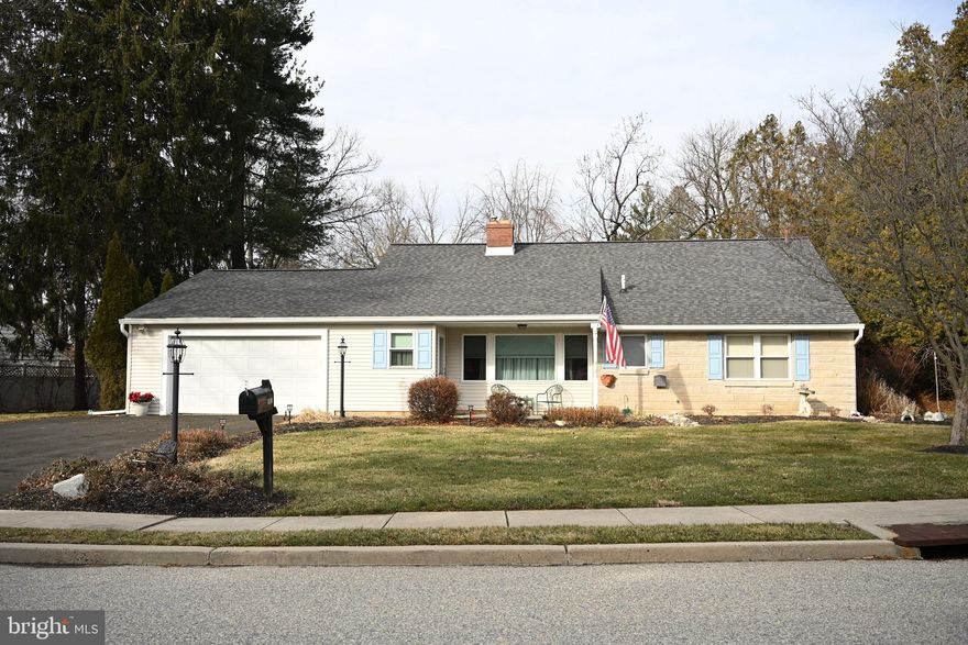 Welcome to this Ranch-Style Retreat nestled on a landscaped property in Historic Springfield Township.  The Inviting Front Porch sets the tone for this Beautiful Home.  Inside there are warm hardwood floors ,  a wood -burning Fireplace with a pretty mantle in the Living room, a New large Matus  bay window ,  a large coat closet and an Open Floor plan.   The Dining room opens to the upgraded Modern kitchen with Granite countertops, High-hat lightening, Gas cooking and a window over the kitchen sink adding  every day comforts.    There is also a convenient Island with seating and extra counter space and storage.. Adjacent to the kitchen  on one side is the convenient laundry room with a laundry tub..  The Kitchen flows into the large Family room which has Tile flooring,  a small gas stove and Lovely Matus French Doors which open to a Stunning  hard-shaped  back Patio that creates the perfect setting for outdoor Dining, a space for gardening, play or entertaining.  There are 3 generous bedrooms all with extra-large closets and 2 full bathrooms. The main bedroom has its own full bathroom. The Garage is  over-sized garage with Shelving on both sides, a key-pad and openers.   The home offers Comfort, Convenience and Modern upgrades throughout with privacy and practicality in a sought-after location.   It's a walkable neighborhood with sidewalks, close to shopping in  Chestnut Hill & Flourtown and many Parks near-by.  Access to #309,  I-476,  Train Stations in CH,  and a short commute to Center City Philadelphia.  
New Roof in 2025, Newer Bay Window.    " Springfield Township, Montgomery County, PA, established in 1681 as "Penn's Manor of Springfield" is over 340 years old with significant history as part
of William Penn's original land ".