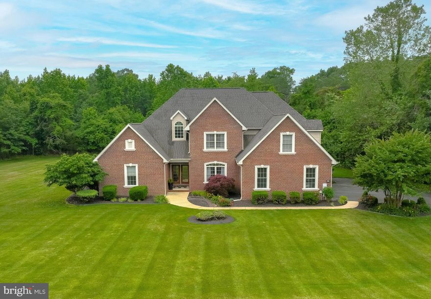 Absolutely stunning Home! Welcome to your dream home at 4301 Nebraska Court, Pomfret, Maryland. Nestled in a peaceful and family-friendly neighborhood, this beautiful single-family residence offers the perfect blend of comfort, style, and convenience. With its spacious layout, first floor primary owner’s suite, gorgeous updated kitchen, on 1.26 acres with a gorgeous in-ground heated swimming pool, this property is a rare gem in Charles County.
This home boasts a generous living area spanning approximately 3,394 square feet, providing ample room for your family to grow and entertain. Beautiful, newer luxury flooring throughout and features four well-appointed bedrooms, with a spacious primary bedroom, with two closets and custom cabinetry, en-suite bathroom, on main level, as mentioned. Step outside from the primary bedroom to a delightful screened in porch that includes a hot tub and seating area, providing the perfect outdoor oasis and bug free area for rejuvenation and relaxation! 
The heart of the home is the gorgeous, updated and spacious eat-in kitchen, a chef's delight!! Complete with stainless steel appliances, an induction cooktop, granite countertops with a large island, custom pantry and plenty of cabinet space, this kitchen is ready for holiday entertaining. It seamlessly connects to the inviting family room, featuring a cozy fireplace and an open floor plan connecting also to the formal dining room. French doors off the kitchen opens to a spacious deck and peaceful backyard that invites you to the gorgeous in-ground heated swimming pool. Whether you’re lounging by the pool, having a barbecue in the summer months, or enjoying a fire pit in the cooler months, this outdoor space is perfect for creating lasting memories. The exterior also features a well-manicured lawn with a sprinkler system, ensuring your outdoor space remains lush and green. Privacy is assured with the fenced yard and treed lot as well! 
The upper level of the home includes three bedrooms filled with natural light and offer plenty of space for the family. The property also offers three full bathrooms and a powder room for guests, beautifully updated with modern fixtures and finishes. Unfinished basement with 1,500  square feet of space for plenty of storage, rough-in for a bathroom and walk up access to the side yard.  Side load garage which enters into the large laundry room/mud room featuring newer Washer/Dryer and leads into the gorgeous kitchen. Additional features - Roof is only 7 years old, backyard shed for your pool supplies/lawn equipment needs.

Conveniently located in a quiet neighborhood, this home offers easy access to major commuter routes including Rt. 210, shopping, schools, and recreational facilities, making it an ideal choice for families and commuters alike.  This property has been meticulously maintained and is move-in ready!!! Don't miss out on the opportunity to make 4301 Nebraska Court your forever home! For more information or to schedule a viewing, please contact the listing agent for a personal tour.