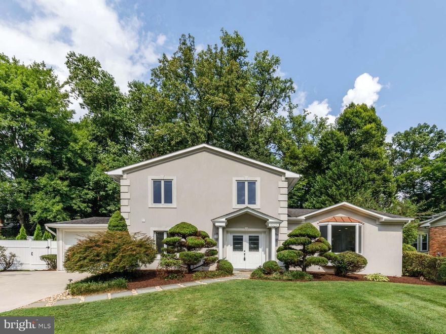 **  Rare Floridian style 4 Bed/3.5 Bath home features with updated kitchen, attached garage, enormous backyard and nestled in Bethesda's coveted Stratton Woods.   Mature landscaping and double doors welcome you to expansive and versatile living and dining areas anchored by the newly updated center-island kitchen.   Perfect for entertaining, enjoy stainless steel appliances, built-in desk with pass-through, pantry closets, abundant cabinetry, breakfast nook, 6-burner gas cooktop and separate wet bar near formal dining.   Additional highlights on the main level include a fireplace, oversized windows, Juliette balcony, convenient powder room, and large mudroom with 2nd refrigerator off the 1-car garage.   Two separate patios flank the kitchen, making Summer BBQ’s a breeze with double access to the verdant and private backyard.  Head upstairs to a bright skylight center hall were you'll find hall bath and four generous bedrooms, including the enviable owner's suite with custom walk-in closet and attached bath boasting a double vanity, soaking tub, and separate glass shower. The lower level presents  a sizable family room, modern tv wall, additional storage, and separate laundry room.    Commuters dream just minutes to 270/495.  Equidistant to both Pike & Rose and Bethesda Row for restaurants, shopping and metro access.  Centrally located just minutes to Balducci's, Wildwood Shopping center and Montgomery Mall.  Walkable to Old Georgetown Swim Club and Walter Johnson Cluster Schools!   NEW SYSTEMS a bonus!