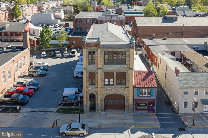 This sturdy building is the former home of Keystone Hook & Ladder Company. The first and second floors have been gutted and refurbished to a beautiful finish. The solid floors and high ceilings are ideal for product or vehicle storage. The 2nd floor is a spacious 3-bedroom apartment rented to long term, reliable tenants. The 3rd floor is currently in shell condition and ready for a remodel. Situated in the Downtown Commercial Zoning District, a multitude of uses are allowed by right including, but not limited to, restaurant, retail store, and fitness center; even a bed & breakfast. This piece of Columbia’s history is ready for your innovation and creativity!