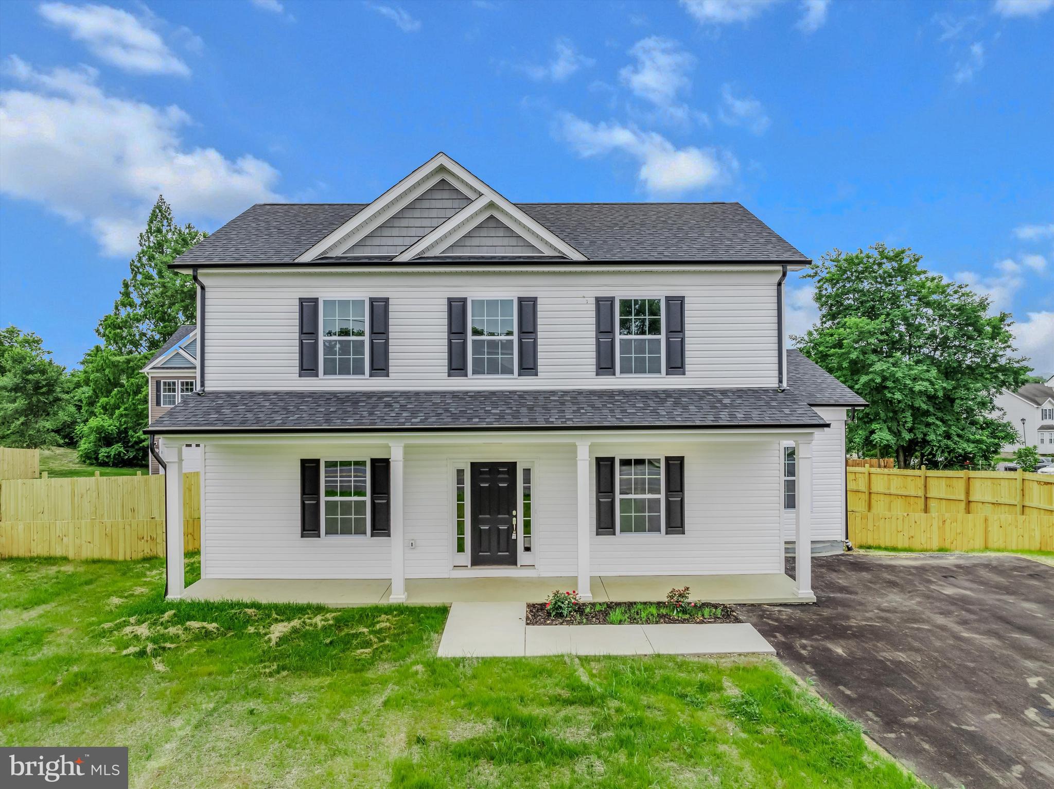 BRAND NEW, MOVE IN READY, and UNRESTRICTED! This flawlessly constructed with attention to detail custom home offers 4 bedrooms and 3.5 baths. The home features a bedroom on the main level, upgraded cabinetry, stainless steel appliances, quartz countertops- in kitchen and all bathrooms, a 12’x12’' deck, luxury vinyl plank and tile flooring, primary bedroom has a tray ceiling with crown molding and bathroom to have a nice tile shower with a bench seat, Fully fenced in back yard and a unfinished walkout basement. Conveniently located. Builder is providing a 1-year Home Warranty. This is a must see! Call today for details!