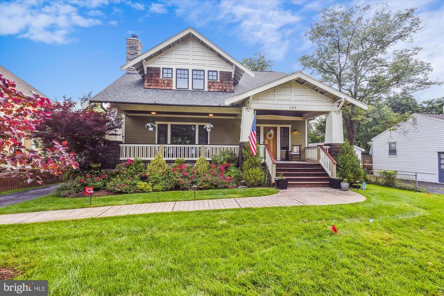 Finally - something different! Charming and rarely available Bungalow style home right in the heart of downtown Vienna! Built in 2008 by Vienna builder Bungalow Homes. The covered large front porch welcomes you into a stunning, bright and open floorplan. The foyer has hooks and a seating area to welcome guests, then opens into a large family room with custom woodwork with a focal point on a fireplace currently setup for wood, but has a gas line installed and ready to be converted to gas if you wish. The stunning kitchen features white cabinets, wall oven/microwave, gas cooktop, large island with seating, built-in table with custom bench seating, large window overlooking the yard, and fridge. There are 2 more rooms on the main level - one currently used a formal sitting room and the other as a formal dining room with recessed lighting and a gas fireplace. The back of the main level features a full bath, large laundry room, walk-in pantry, and mud room with hooks and a bench. There's a door that leads to a covered back porch, with a natural gas line for a grill (currently not connected), and a large deck and pergola built in 2011 overlooking the amazing fully fenced yard, which features a trampoline and playset (both convey). Upstairs the primary bedroom features a walk-in closet with barn door, en-suite bathroom with soaking tub, double vanities, walk-in shower, and water closet. The 2nd bedroom features built-in bookshelves, vaulted ceiling with wood beam, walk-in closet, and en-suite bathroom with tub/shower. Bedrooms 3 and 4 each have access to a buddy bath, built-ins, and vaulted ceiling. The finished lower level had upgraded flooring installed in 2012. The large 5th bedroom has carpet and a large closet. There's a 5th full bathroom in the basement. Multiple areas in the basement to choose from: a family room with gas fireplace and mantel, and 2 more rec spaces. There are two utility closets each with storage. **VIENNA WOODS MEMBERSHIP CONVEYS** Skip the line! Other upgrades: fence 2012, irrigation system 2013, outdoor lighting 2013, whole house humidifier 2014. Amazing location - 1 block to the Vienna Farmers Market and Community Center, 1 block to the W&OD trail, 2 Blocks to Vienna Elementary School, and half a mile to Church Street. Enjoy Vienna events like the Halloween Parade, Viva Vienna, Chillin' on Church, and Oktoberfest!