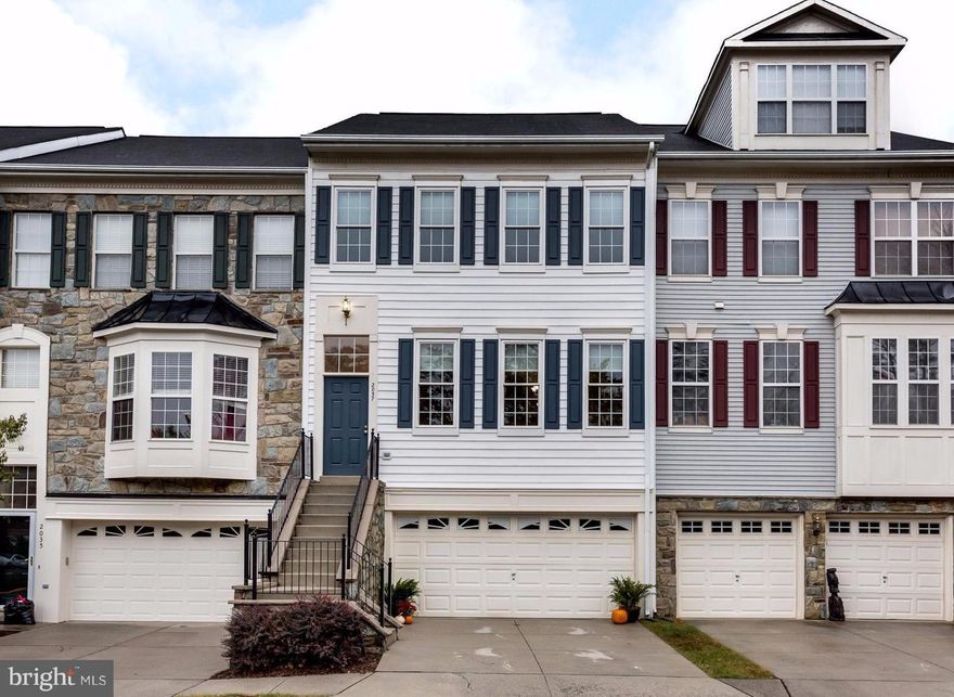 Others don't compare! Bright & updated: Fresh paint thru-out, new carpet, generous deck & patio + planters, Kitchen with granite counters, tile backsplash & stainless appliances, main lvl hardwoods, Master BR w/ 2 walk-in closets. Generous walk-out lower lvl w/ FP & tall ceilings. Garage w/ xtra storage & workbench. Updates (1-2 yrs): Windows, sliding glass doors (2 sets), replacement furnace & AC