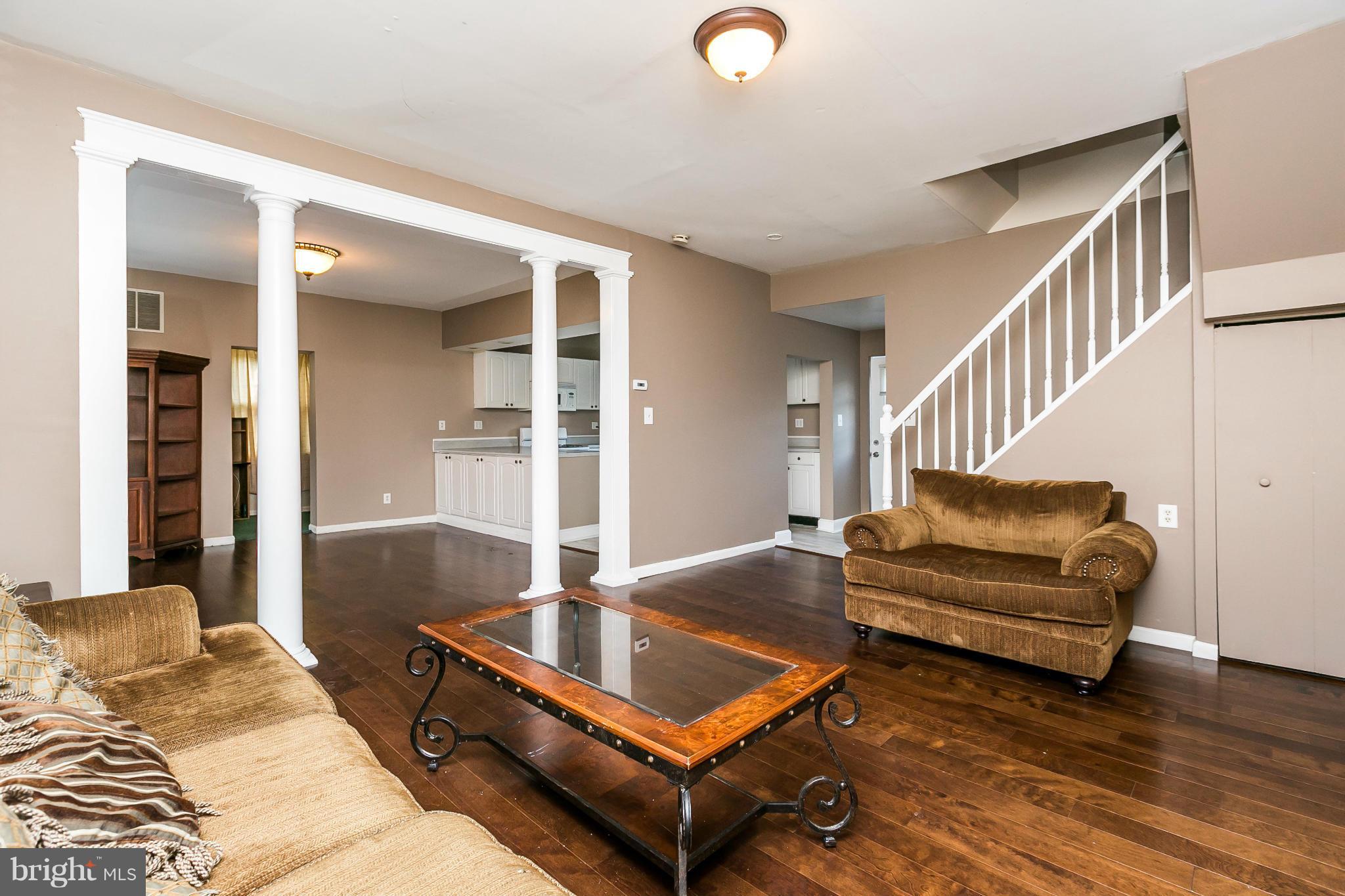 This spacious home has a LR, DR, den/office, kitchen & full bath on 1st floor. 3 BRs & a full bath on the 2nd floor. There's also a small room on the 2nd floor that can be used as a possible 4th BR. Washer/dryer conveniently located on 2nd floor. New hardwood floors in LR & DR. New carpets on 2nd floor & fresh paint throughout. Large deck off back & plenty of off-street parking.