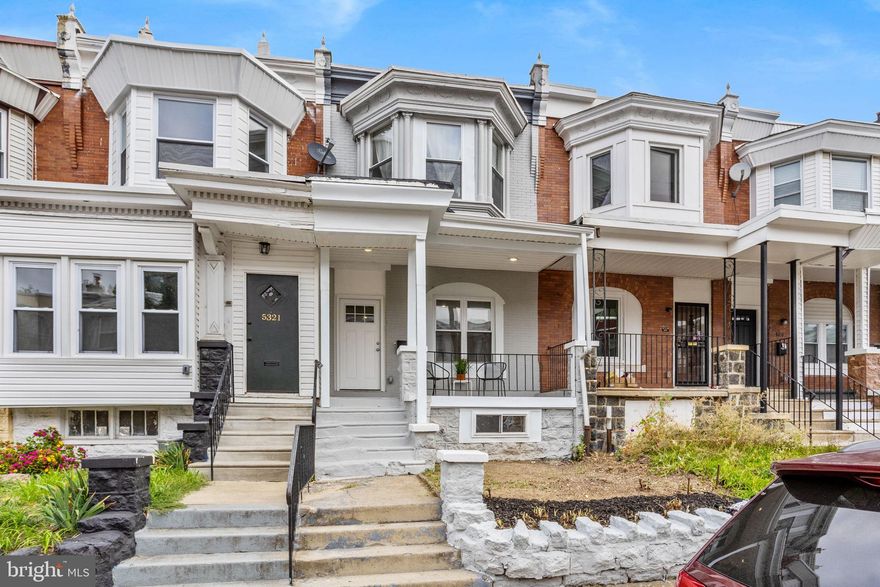 Welcome to this beautifully renovated home in the heart of West Philadelphia, offering an exceptional blend of space, character, and modern updates. Step through the inviting front porch and into a grand living room featuring soaring ceilings and stunning trim work that immediately sets the tone. The main level flows seamlessly into a spacious dining area and an open, airy kitchen designed for both everyday living and entertaining. This level also includes a convenient half bath, coat closet, additional storage nook, and access to your private backyard perfect for relaxing or hosting guests. Upstairs, you'll find three generously sized bedrooms, including a comfortable suite with its own private bathroom, an additional full hallway bath, and a bonus den ideal for a home office or flex space. The lower level offers an expansive open area with endless possibilities, along with a utility room, additional storage, a half bath, and a dedicated laundry area. Conveniently located near restaurants, parks, and public transportation, this impressive home truly has it all.