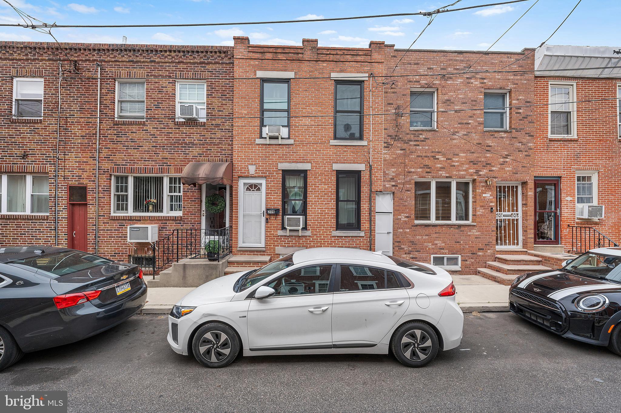 MULTIPLE OFFERS RECEIVED. ALL OFFERS DUE MONDAY 6/30 AT 3PM. Welcome to your delightful Pennsport haven, just a stone’s throw from the serene Dickinson Square Park. This lovingly cared-for two-story rowhome, boasting 2 bedrooms and 1.5 baths, is packed with charm and thoughtful updates — perfect for anyone dreaming of that authentic South Philly lifestyle.
Sunlight pours through newer hardwood style floors, lighting up the open, airy space that feels both cozy and inviting. The kitchen, outfitted with gleaming stainless steel appliances, is ready for everything from casual weeknight dinners to lively gatherings with friends. Upstairs, two snug bedrooms with fresh carpeting offer peaceful escapes, complemented by a pristine full bath. Plus, a thoughtfully added half bath on the main floor adds just the right touch of modern convenience.
Storage is a breeze with a spacious walk-in closet, and the tidy, organized basement doubles as a peaceful nook — ideal for a home office, creative studio, or just a quiet retreat. This home marries history with modern sensibilities. Thanks to brand-new Anderson Windows (installed in 2022) and an updated home heating system (installed in 2020) the home can be filled with natural light while staying energy efficient and warm in the winter. The sellers also went the extra mile with a re-roof in 2021 with proper maintenance since, so you can rest easy knowing your home is well protected.
Step outside to your private backyard patio — a charming little oasis perfect for morning coffee, gardening, or warm summer evenings spent with loved ones. With a Walk Score of 92, you’re living in a true walker’s paradise, steps away from the vibrant buzz of East Passyunk Avenue, the legendary 9th Street Italian Market, and local favorites like Rebel and Wolf, Jaxx’s Steaks, 2nd St Brewhouse, Beer Boutique, and a treasure trove of beloved delis.
Commuters will appreciate the easy access to I-95 and two local bus routes right around the corner, making your daily travels a breeze. And when you’re craving a getaway, the shore is just an hour’s drive away — perfect for those spontaneous beach days.
This isn’t just a house; it’s a lifestyle wrapped up in community, comfort, and convenience. Don’t let this South Philly gem slip away — schedule your tour today!