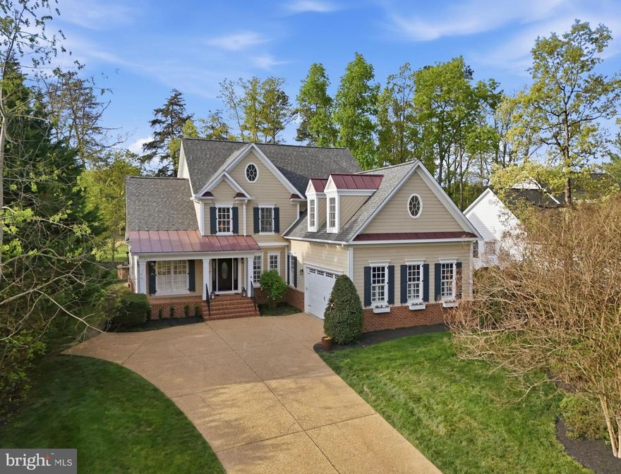 This Extraordinary Custom Dream Home in Fawn Lake overlooking the 13th Tee of the signature Golf Course fuses casual luxury and sophistication with resort style living.  A Southern Style Residence with a well appointed interior curated with superior craftsmanship and filled with timeless ​upgraded finishes, effortlessly blends indoor and outdoor living.​ Beautiful grounds enhance the curb appeal that leads to this Gorgeous ​turn-key Dream Home with a welcoming front porch.  The Foyer with soaring ceilings, rich millwork, and solid Oak ​wide-plank flooring, sets the stage from the moment you step through the door. An elegant Dining Room with exquisite details, and large windows provides a perfect backdrop for formal gatherings.  A handsome Study features built-in Bookcases, coffered ceiling and large windows. ​
Designed for both luxurious daily living and impressive entertaining​, the Family Room with Vaulted Beamed ceilings is anchored by a stone see-through fireplace.  A Sun Room with large windows, and gleaming hardwood floors harmoniously create a space that is elegant and inviting.​ 
The Gourmet Kitchen is the ultimate chef's dream! Equipped with high-end stainless appliances, to include a commercial-grade Gas Stove. Complete with built-in Miele Coffee Machine, upgraded Maple cabinetry, granite countertops, tile backsplash.​   An inviting Breakfast Room lined with windows providing an abundance of sunlight, offers a quaint spot for enjoying meals. French doors provide access to the charming Porch with brick pavers with steps leading to the amazing Courtyard.  The Gracious main level Owner's Suite featuring a a luxurious Spa Bath with a soaking tub, large shower, dual vanities, and a fabulous walk-in closet with laundry.  A set of French Doors offer private access to the incredible Screened Porch with breathtaking views of nature and the Fairway.  The wide staircase leads to the upper level bedrooms and a great Flex Space.  A gracious Bedroom with a large walk-in closet and private Bath, plus two additional bedrooms with walk-in closets sharing a Full Bath complete the upper level. 
The attention to detail continues in the finished lower level, designed with abundant features to entertain. 
An amazing custom Pub Style Oak Bar with Fridge, Ice Maker, Beverage Fridge, and dishwasher anchors the huge Rec Room.  Enjoy your favorite movies and shows in the incredible Theater Room with tiered seating and a large screen.  The Game Rm offers ideal space for fun game nights.  A gym provides ample space to work on your fitness.  A Gracious Bedroom with an adjoining Full Bath is perfect for guests. 
​The backyard sanctuary is equally majestic! An incredible stone Fireplace is the main attraction of the private Courtyard, set against the backdrop of sprawling grounds and lush landscaping. The large patio has a built-in stone Bar, with granite counters, ideal for extended outdoor living, dining and entertaining.      
Enjoy breathtaking sights and sounds of nature as you meander through the park-like grounds. Nestled ​on ​.46 acre lot overlooking the Fairway. ​ Recent updates include​ a new roof ​in 2026, Hot water heater​ in 2026, Fridge in 2023, Dishwashers in 2022. Refinished Solid Oak ​​hardwood floors​, and freshly painted interior! Your Luxury Forever Dream Home awaits!  **The beautiful luxury, gated and vibrant Fawn Lake Community offers amazing amenities such as a recreational lake, beach, an Arnold Palmer designed Golf Course, pickleball and tennis courts, baseball and soccer fields, dog park, volleyball courts, walking trails, Club House, marina, fitness center, restaurants, Country Club, playgrounds, and more! Plus with an array of clubs, groups and daily activities, you will have plenty of opportunities to join the social scene, make new friends and remain active! Located near Fredericksburg, surrounded by park lands. Conveniently located to shopping, I-95 and Riverbend District schools!