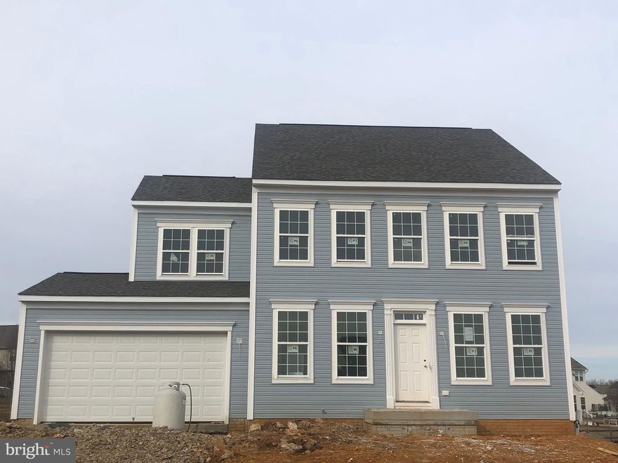 April Delivery!  Gorgeous 4 bedroom, 2 1/2 bath home w/4ft. rear ext. on all 3 levels, hardwoods on entire 1st floor, designer kitchen w/maple cabinets, granite, island & stainless appliances.  Family room w/gas fireplace.  Master suite w/dual walk-in closets, upstairs laundry.  Full unfinished walk-up basement w/3 piece rough in to expand later!!