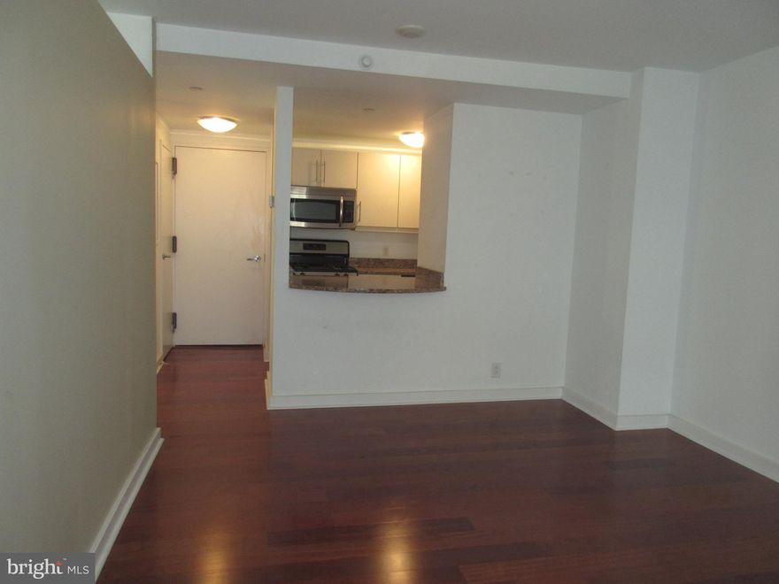 Beautifully appointed one bedroom, one bathroom on Rittenhouse Square. This sun-soaked flat features a combined living and dining room with Brazilian cherry wood floors; a modern kitchen with updated cabinetry, granite countertops, stainless steel appliances and a breakfast bar; generously sized bedroom with carpeting and a wall closet; and a full hall bathroom with a single vanity and shower/tub. Residents of Parc Rittenhouse enjoy world class amenities and services including a 24 hour doorman; an amenities suite that includes a state-of-the-art fitness center and resident lounge with pantry; media room; outdoor rooftop pool club with a large pool deck, full size pool, kids pool and hot tub; garage parking below the building for an additional fee; and three amazing restaurants on the ground floor, Stephen Starr’s Parc, Devon Seafood and Via Locusta.