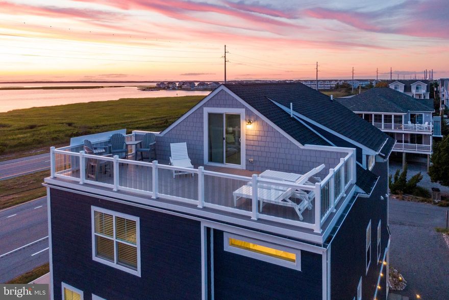 Coastal Living Redefined ​in North Bethany Beach 

Perfectly positioned between the ocean and the bay, this newly constructed custom masterpiece offers the ultimate blend of comfort and luxury—just steps from a pristine private beach. Painstakingly designed for effortless beach-life living, the residence features a state-of-the-art chef’s kitchen, floor-to-ceiling windows, soaring coffered ceilings, and open, light-filled interiors.

An entertainer’s dream, the home’s modern layout opens seamlessly to multiple expansive decks—ideal for lounging, sunset cocktails, and classic crab feasts. 

Every detail has been thoughtfully curated to enhance life at the beach. Located in the sought-after private community of Tower Shores, residents enjoy the serenity of a secluded shoreline while being just minutes from Dewey Beach’s nightlife, Rehoboth’s award-winning dining, and downtown Bethany’s coastal charm.

Don’t miss your opportunity to own this extraordinary retreat situated on Delaware’s glorious Bethany Beach coastline. Contact Mary Rice to arrange a private tour.  It has an impressive rental history and grossed over 100k in 2025