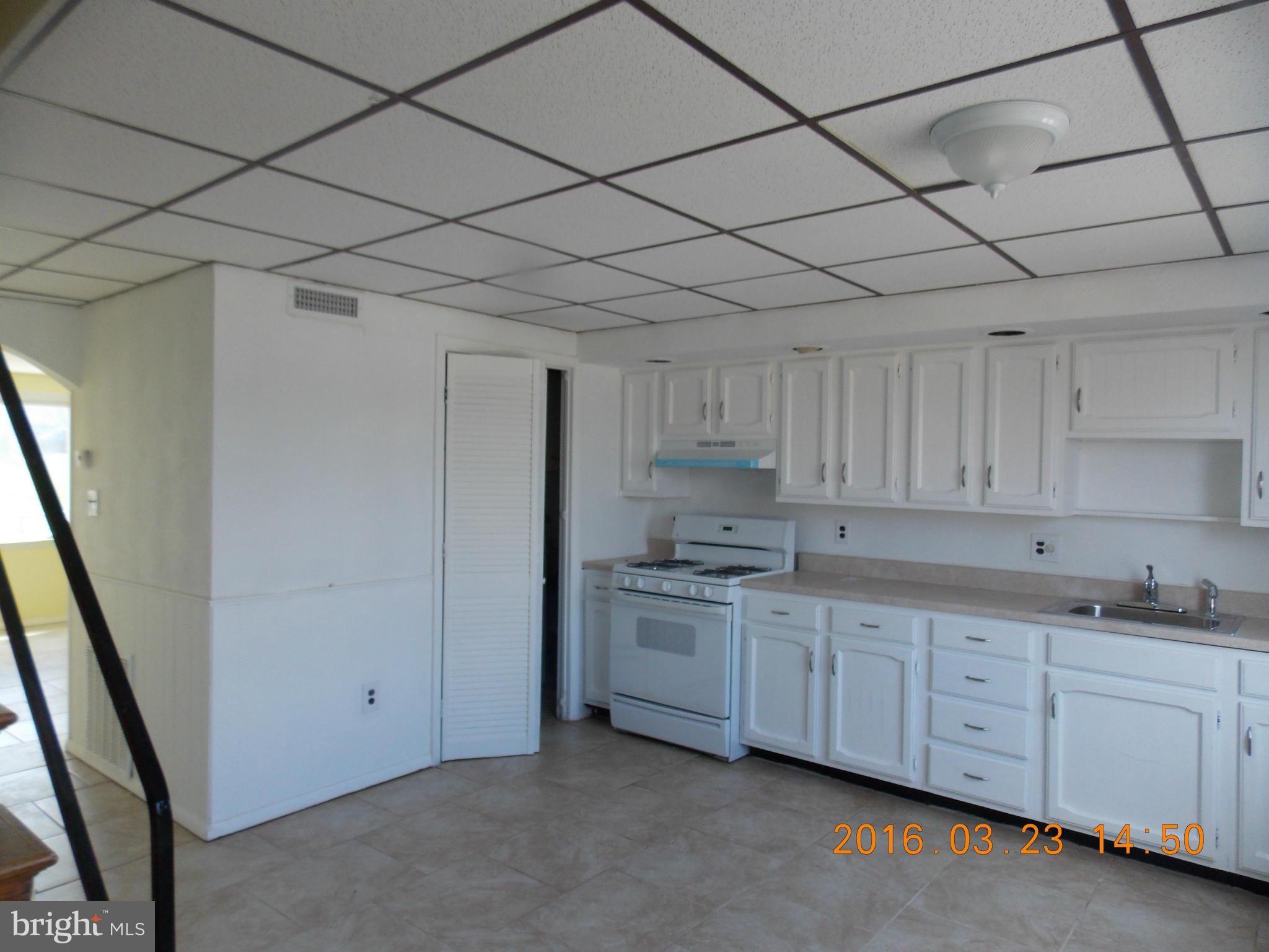 Move in ready - Can't beat the price on this one. New water heater-2016- parking out back- just a little TLC and you're good to go.Convenient to the mall and attractions and mass transit. Easy to show.
