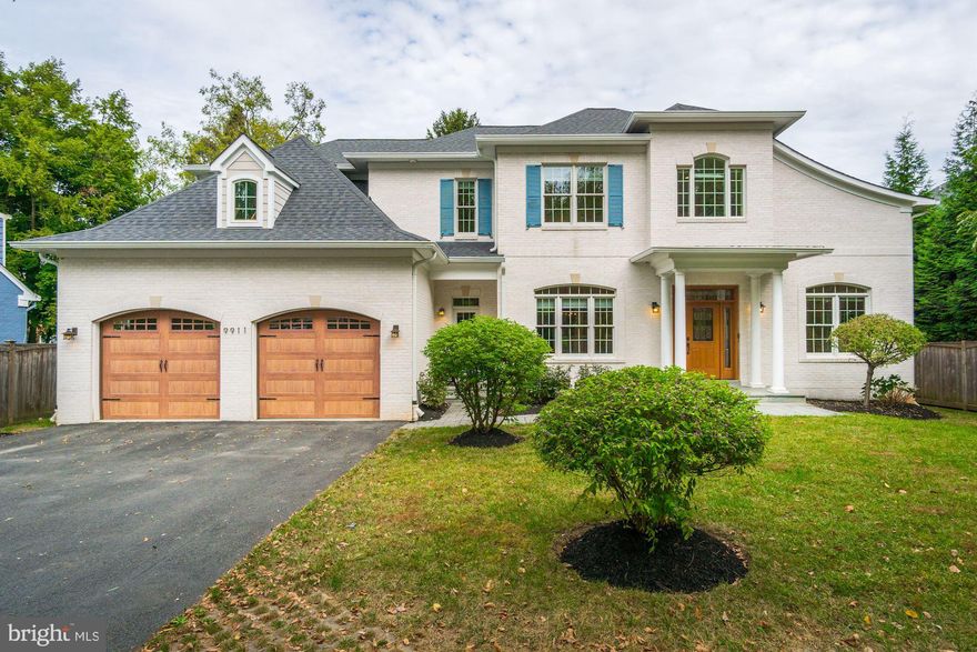 Set back with a private entrance with automatic gate, don't miss this beautiful 5BR turn-key home on a large tree-filled lot! 5000+ sq. ft. of ideal living space including a stunning 2-story family room open to the gorgeous gourmet kitchen! Main level study, laundry/mudroom connected to the 2-car garage. Expansive Master suite with beautiful Master bathroom & walk-in closet. Fully-finished walk-out lower level featuring an au-pair suite with separate entrance, bar area and an oversized movie room/recreation room. Private views in the large fully-fenced backyard with patio. A wonderful home in a great location with convenient access to I-495/270.