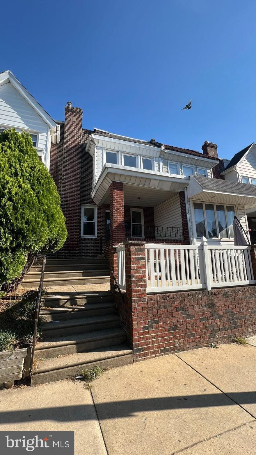 PRICE REDUCED. Seller is motivated. Beautiful row house with front patio. Modern kitchen. 3 spacious bedrooms. Great for self to live and investment.