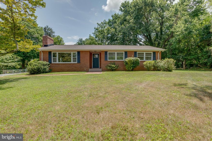 Owner will consider financing with 15percent down. Call for terms. Wonderful one level living in an all brick rambler that has been recently updated. All interior just painted, new light fixtures and hardware. 3 large bedrooms. Primary has full bath with shower. Family room has built in shelving and lots of windows. Full basement for expansion.
Living room has wood burning fireplace.  New Roof recently installed, Heat pump just 2 years old.  A new Dollar General is being built 1 mile away for those last minute items. Close to Rt 29 yet private and on DC side of Warrenton. This house is a gem just waiting for new owners.