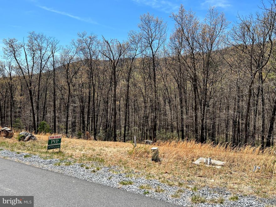 Beautiful lot in a well established community.  Rear of property borders Sleepy Creek Wildlife Management Area!   Grinder pump is required when constructing the home.  Class A FAMILY membership is available and the  $3150 initiation fee is waived. Annual club dues are $2500.Private Club Amenities are not owned or operated by the HOA nor are their dues included in the HOA fees. Private Club Amenities include: Golf (Greens Fees), Driving Range, Chipping Green, Putting Green, Indoor Sports Center (racquetball, indoor pool, gym, aerobics room, laundry facilities, sauna, steam room, whirlpool, volleyball ,indoor & outdoor tennis, indoor & outdoor basketball, shuffleboard, pickleball) , 2 Outdoor Pools, Clubhouse, Club Room, Baseball Field, Playground, Fishing Ponds. Other onsite amenities include: The Clubhouse Grille & Pub and the Sleepy Creek Spa & Salon.