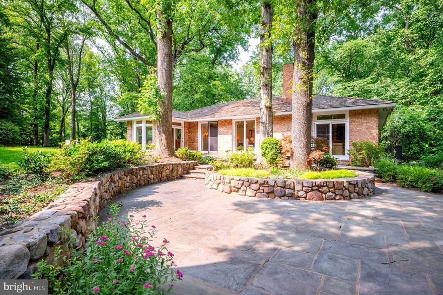 Magical Setting for Distinctive Home.  Gorgeous Private 1.2 Acre Parcel has been professionally Landscaped to Create a Peaceful and Serene Oasis Just Minutes to  Downtown McLean, Tysons and DC.  Home Takes Full Advantage of the Lush Surroundings with Large Windows and Multiple Doors Leading to Exterior Entertaining Spaces.  The Main Level of the Residence is Open Concept with Rooms Emanating off a Spacious Center Foyer.  Three Bedrooms Including a Primary Suite are Discreetly Located down a Private Hall.  Lower Level also has Access to the Grounds and Multiple Patios.  A Large Multiuse Room, Storage Area as well as another Bedroom and Full Bath are Located here.   Public Sewer and Natural Gas are available for Hook Up.