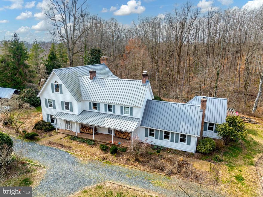 Welcome to a piece of Americana, nestled on 28.5 acres of picturesque land, where the charm of yesteryear meets modern luxury. The original home was believed to be built in the 1870's, with a major renovation and expansion taking place in 1990.  This spectacular farmette boasts over 5000 square feet of meticulously maintained space, offering a harmonious blend of heritage and contemporary living.  The previous owner hired special craftsmen and brought materials to create the addition to match the 19th century farm house.  It flows seemlessly. 

Escape the hustle and bustle of city life and immerse yourself in the tranquility of rural living. Surrounded by rolling hills and lush greenery, this property provides an idyllic retreat for those seeking peace and privacy. Whether it's morning coffee on the porch or evening strolls through the expansive grounds, every moment here is a celebration of nature's beauty.

Step inside to discover a residence that exudes character at every turn. From the grandeur of the spectacular home that boasts  warm living spaces, every detail reflects a bygone era of craftsmanship and elegance. Yet, don't let the historic charm fool you—modern amenities seamlessly integrate with the traditional architecture, offering the best of both worlds.

With 5 bedrooms and 4.5 bathrooms, including an separate in-law or aupair suite, there's ample space for family and guests to unwind and rejuvenate. Each room is thoughtfully designed to provide comfort and functionality, ensuring everyone feels right at home. From cozy fireplaces to sunlit reading nooks, every corner invites you to relax and indulge in the simple pleasures of life.

Step outside to explore the expansive grounds that define this extraordinary property. Whether you're a nature enthusiast, an avid gardener, are looking for place for horses or simply enjoy outdoor recreation, there's something for everyone here. From sprawling lawns to tranquil woodlands, the possibilities are endless—create your own oasis and let your imagination run wild.

Despite its rural setting, convenience is never far away. Situated within easy reach of amenities, schools, and major highways, this property offers the perfect balance of seclusion and accessibility. Whether you're commuting to DC or Annapolis,  everything you need is within reach.

Don't miss this rare opportunity to own a piece of colonial America and create memories that will last a lifetime. Whether you're seeking a weekend retreat, a family estate, or a unique investment opportunity, this historic farmette is sure to captivate your heart and imagination. Schedule your private tour today and experience the magic for yourself!