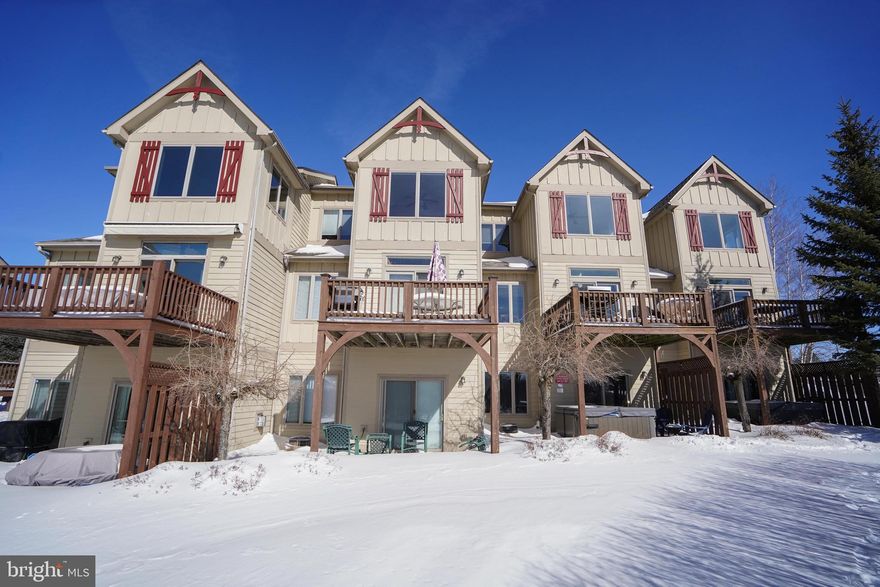 Looking for condominium living with western exposure for great sunsets, views of Wisp resort and lake views? 267 Mosser Road #1 may be the place for you! This end unit offers 4 bedrooms, 3 full bathrooms and 3 levels of living with over 2000 square feet of living space. Condo ownership offers ease and enjoyment so you can spend more time making memories at the lake! The functional floorplan offers 1 bedroom and full bath on main level, 2 bedrooms and 1 full bath upstairs, and 1 bedroom with full bath downstairs. Multiple living rooms provide room to expand and entertain guests comfortably. The walkout basement offers a hot tub just outside the basement slider door. Established vacation rental! Located in the heart of McHenry, this home offers  location within minutes to all of the amenities and attractions you come to the area for! Many recent improvements including water heater, certain appliances and new carpets on the main level. Want to schedule a private showing? Call today!