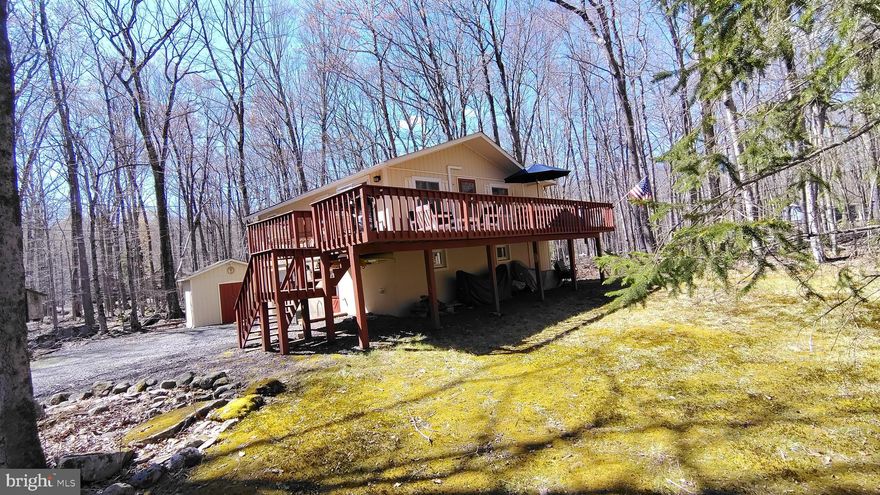 Welcome to 249 Selig Rd, nestled in the highly desirable Locust Lake Village an award-winning community in Pocono Lake, PA. This charming 3-bedroom, 1.5-bath home offers the perfect opportunity for a relaxing vacation retreat or a comfortable full-time residence. Surrounded by the natural beauty and serenity of the Poconos, this home invites you to unwind and enjoy every season. A spacious wraparound deck provides the ideal setting for morning coffee or evening gatherings, while the finished lower level adds extra living space for entertaining or relaxing. With nature as your backdrop and endless nearby attractions to explore, this home truly captures the essence of Pocono living. Come experience it for yourself—you may just find it’s exactly what you’ve been looking for. measurement approx. Make your appointment today
