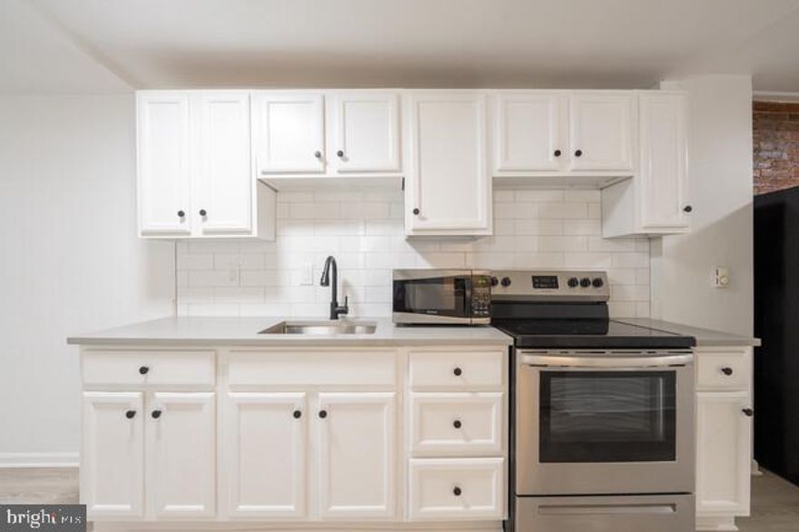 Discover your ideal apartment in Mount Vernon Residences, where modern living meets historic charm in the heart of Mount Vernon. Nestled in this picturesque neighborhood, our stunning apartments offer a refined living experience like no other.

These updated apartments step into spacious open floor plans with soaring ceilings, creating an airy, welcoming ambiance that's flooded with natural light. Your gourmet kitchen, adorned with sleek appliances and black matte hardware, will inspire your inner chef. The custom walk-in closets, engineered hardwood flooring, quartz countertops, greenery accent wall, and posh lighting add more than a touch of opulence to your everyday routine.

Mount Vernon, where suburban serenity meets urban vitality. Ideal for families and young professionals, this lifestyle destination offers a perfect fusion of tranquility and excitement. The community is steps away from Baltimore Penn Station as well as vibrant dining, renowned cultural attractions, lush green spaces, and the prestigious Johns Hopkins campus. Discover Mount Vernon: Your ideal city retreat.

Your oasis awaits and we are ready to help you find your dream apartment at Mount Vernon Residences!

Please note that the photos are of a model home at Mount Vernon Residences.